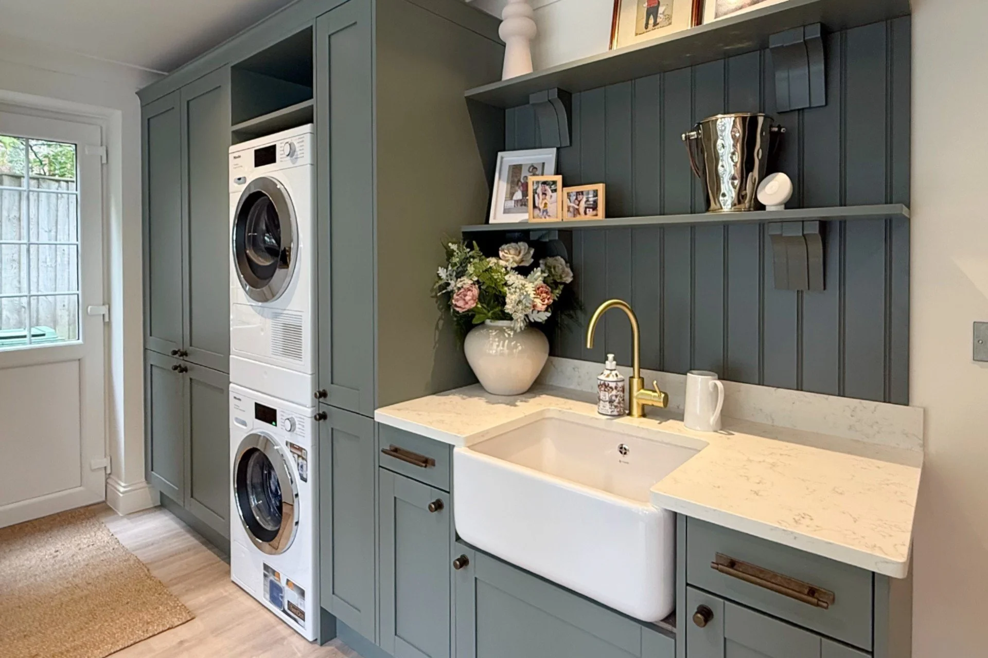 Green Shaker kitchen style utility room