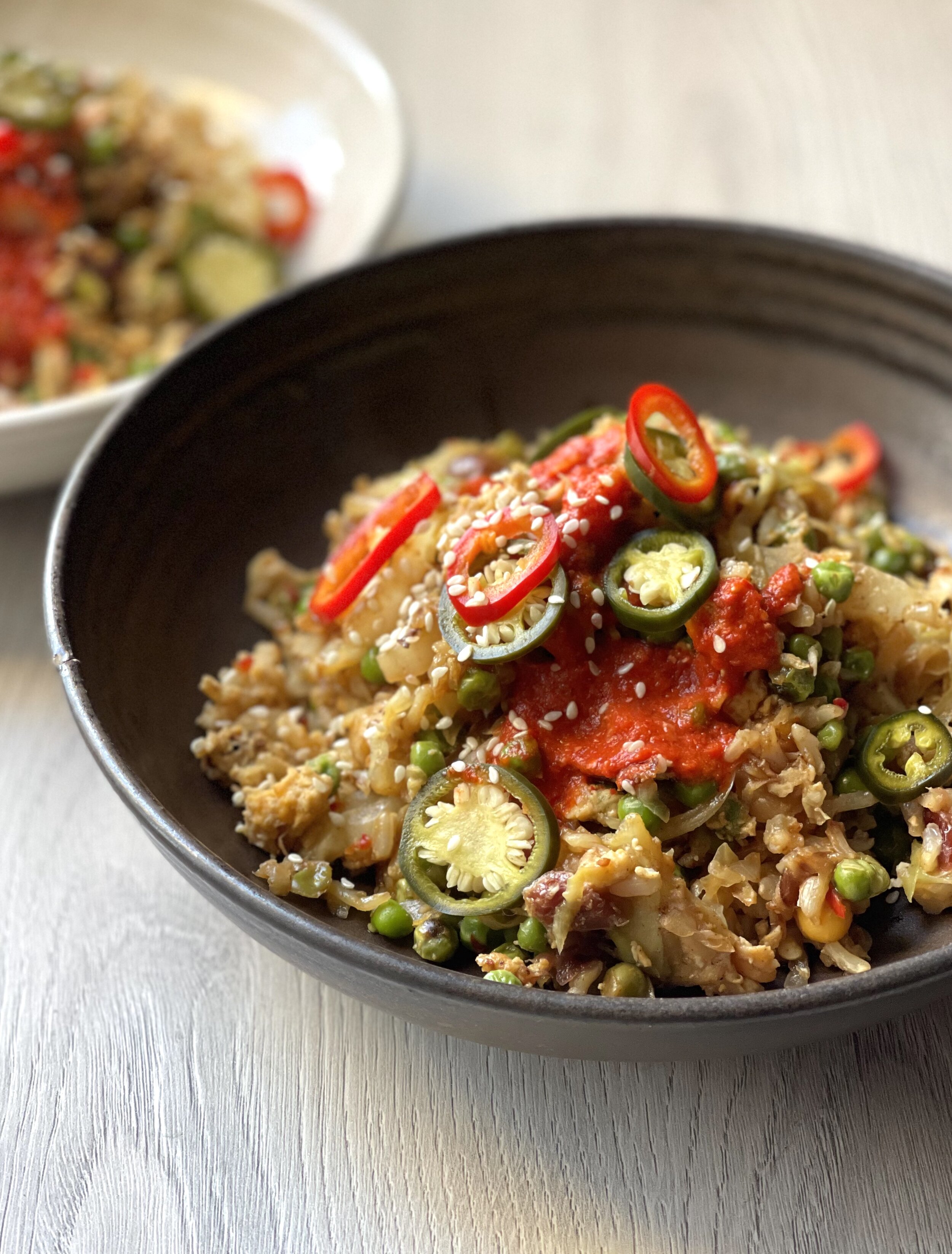 Red and green pickled chillies on vegcentric egg-fried rice