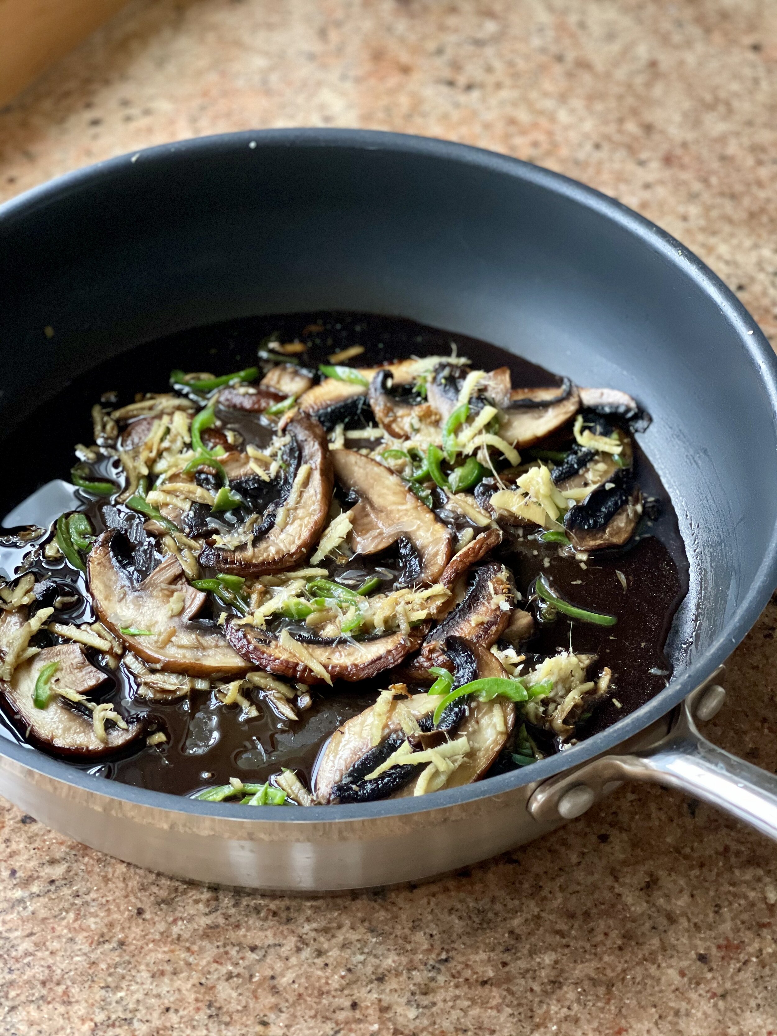 Mushroom and sesame oil sauce with ginger and garlic