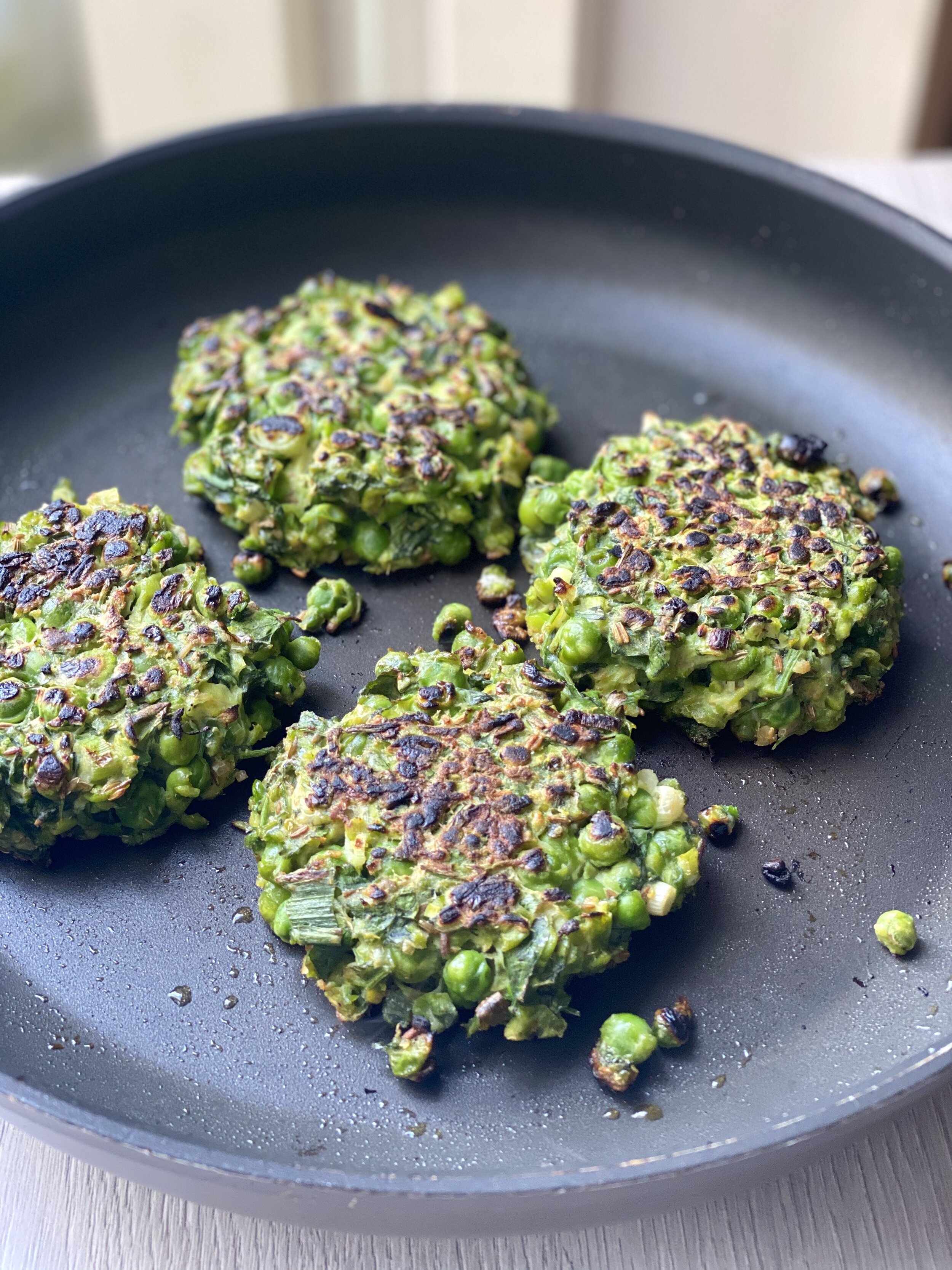Fragrant pea fritters in a pan