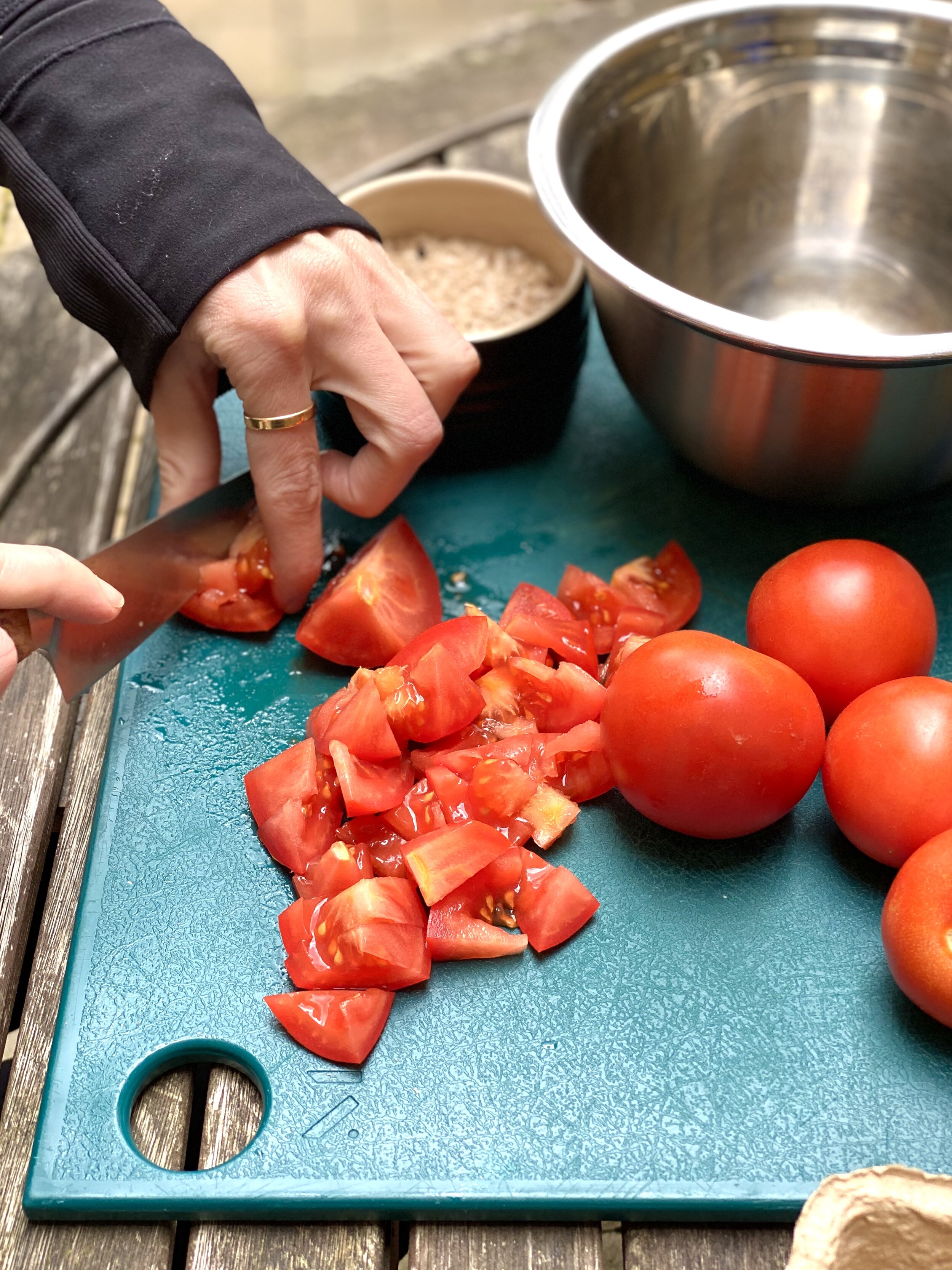 Katy cutting tomatoes