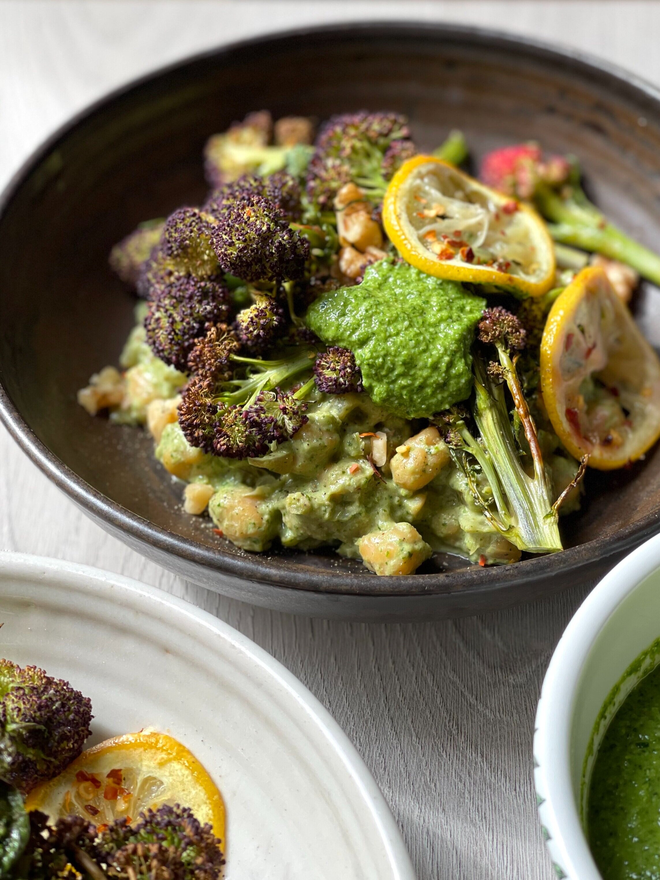 Purple sprouting broccoli with creamy chickpeas and watercress pesto