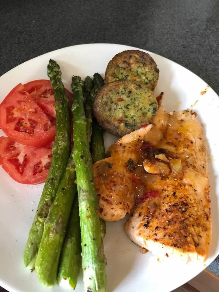 Grilled chicken with roasted pineapple glaze, veggie patties, asparagus