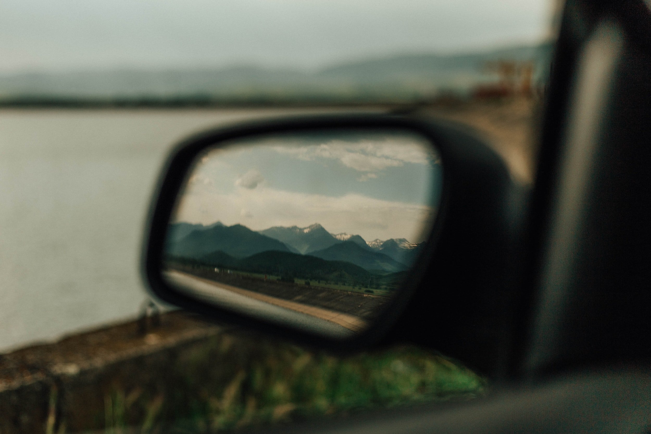 rear view mirror on a road trip
