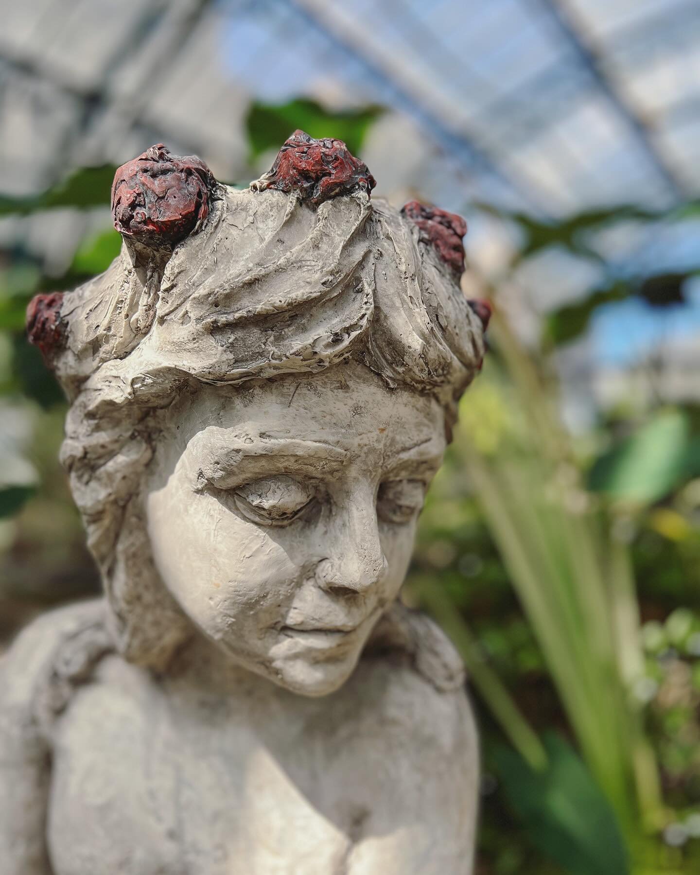 Entering into this greenhouse in the Palermo Botanical Garden felt like stepping into a novel. Oh, the wild tangle of plants - not completely neglected and not yet tamed! The space absolutely fit this sweet statue of a little girl hanging out with he