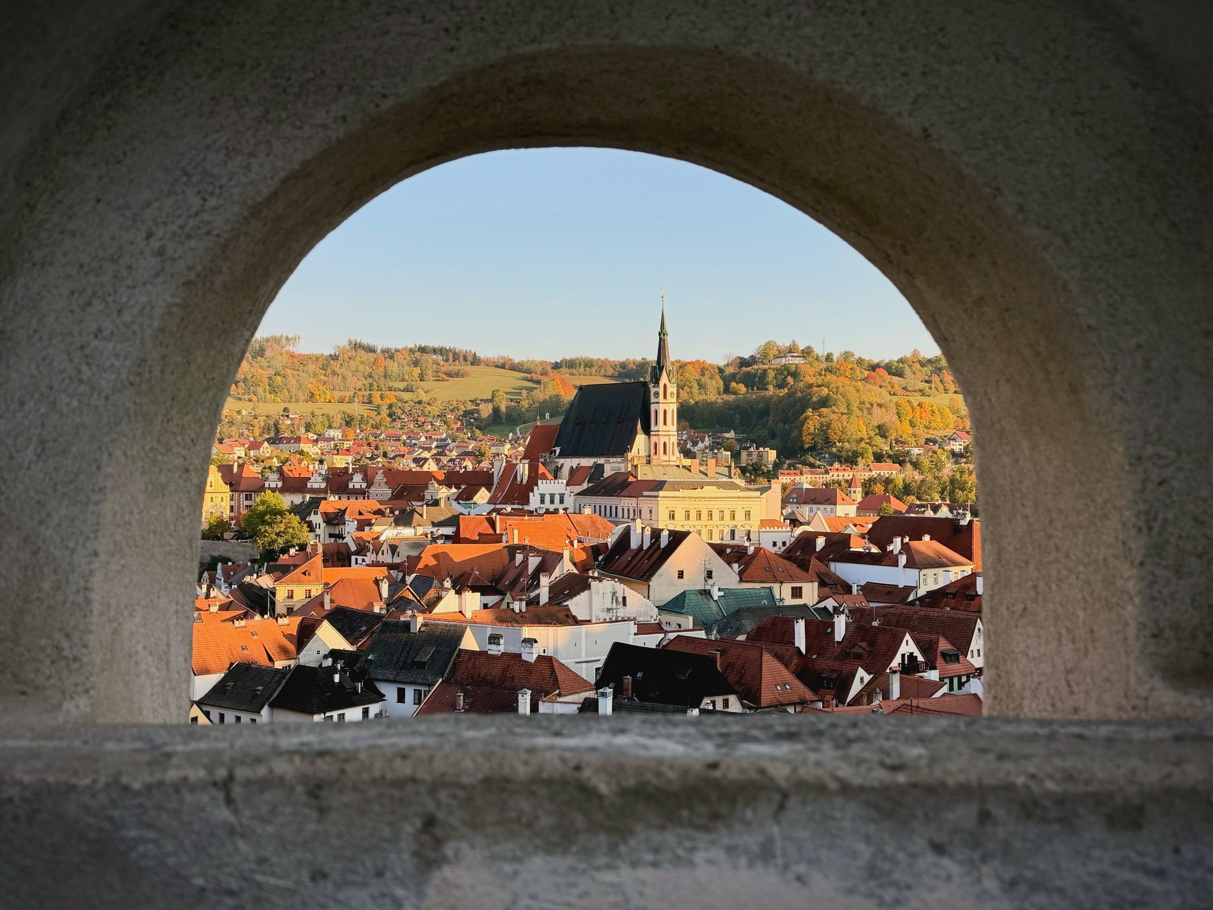 Česk&yacute; Krumlov at golden hour. The Vltava River wraps right around the old town, and every rooftop and painted wall turned gold as the sun went down. One of the prettiest places I&rsquo;ve ever wandered. (Spot the cat on slide 4.)
Soundtrack: S