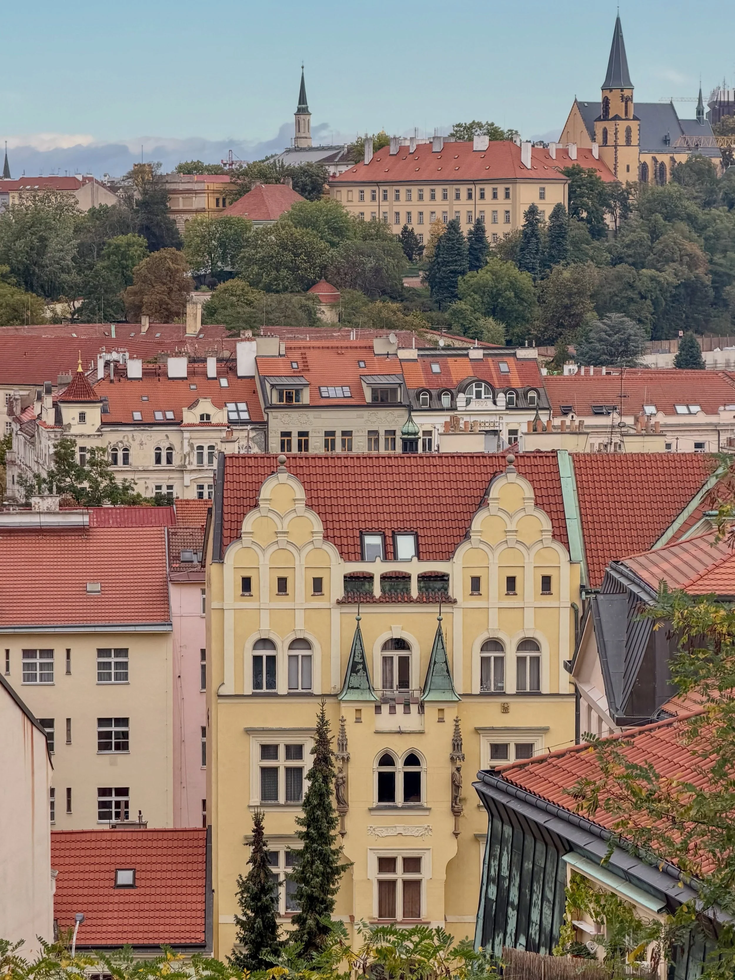 We love architecture. We know almost nothing about architecture. 🙈

Prague has gems on every street: turrets, gables, little copper domes, and buildings in butter yellow, mint and cream.

There&rsquo;s a building in Vy&scaron;ehrad that&rsquo;s home
