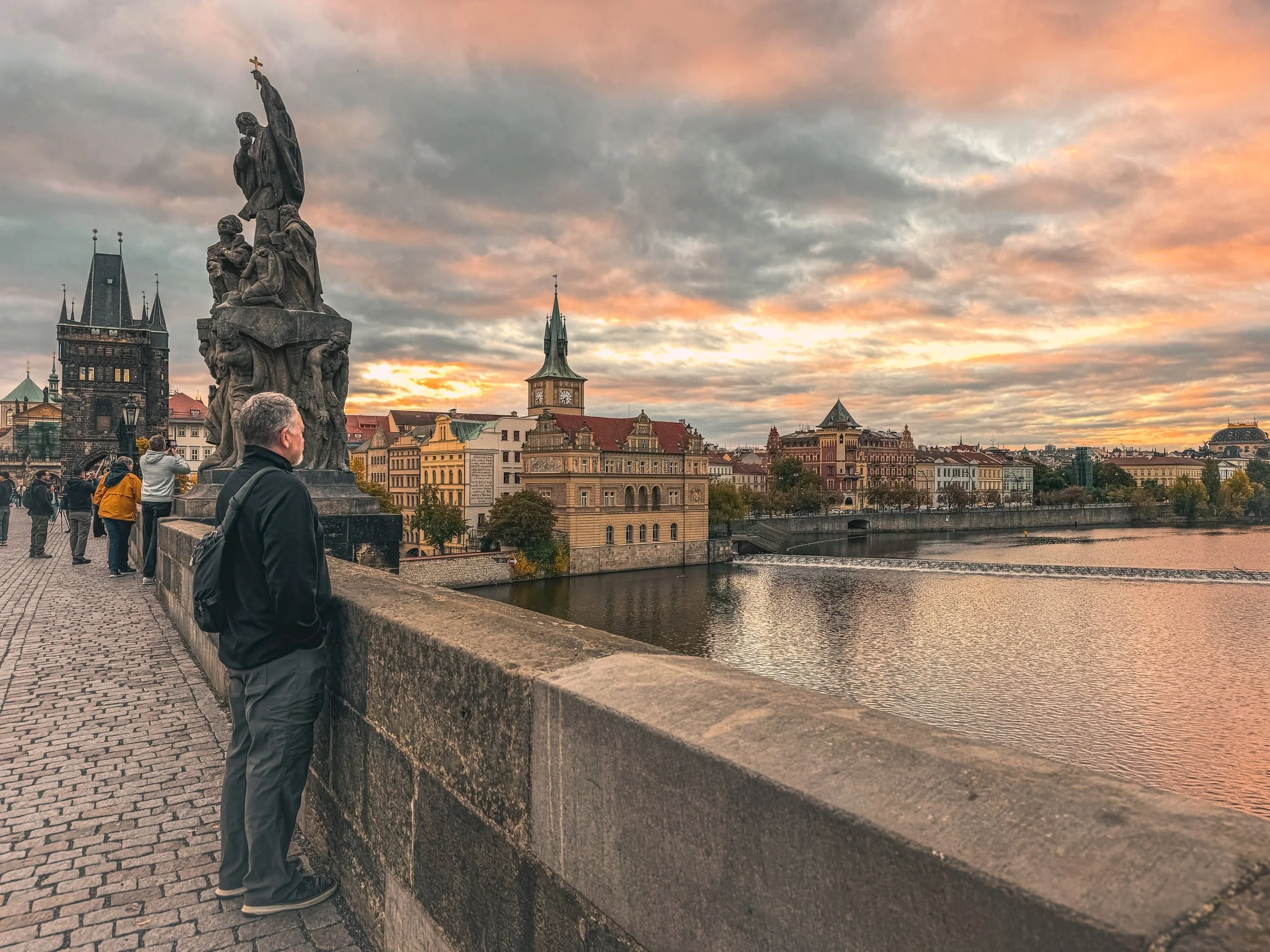 Charles Bridge at 7:30 am.
No crowds, no tour groups, just a few photographers, a jogger, and the sun coming up over Prague. By 8:30 it was filling up. By midday, you could barely see the cobblestones (zoom in on the last slide).

If there&rsquo;s on