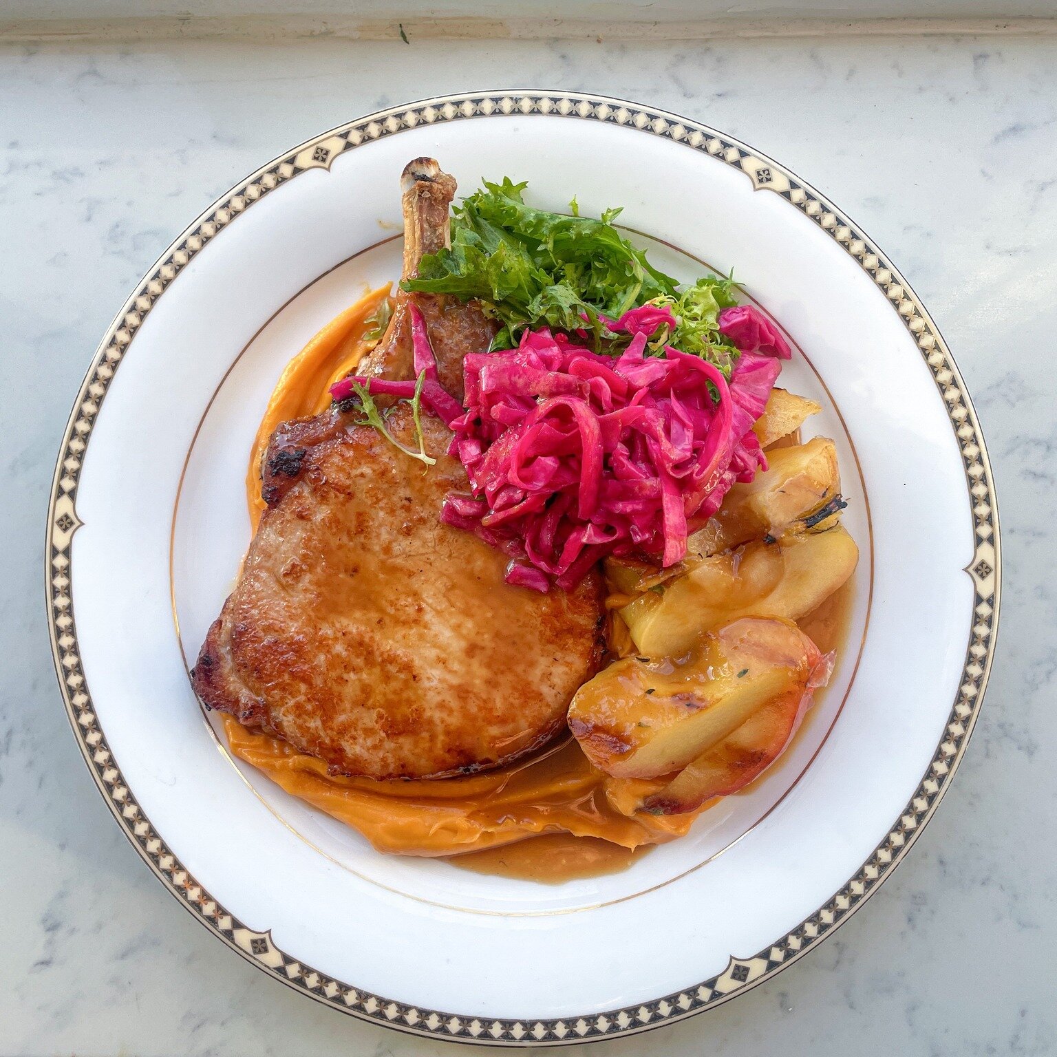 Pork and Apples: A sweet and savory filling dish. bone-in 16oz pork chop with creamy sweet potatoes, bourbon apple glaze, caramelized apples, and pickled cabbage.
Pair with the la quercia montepulciano
#sweetandsavory #porkchops