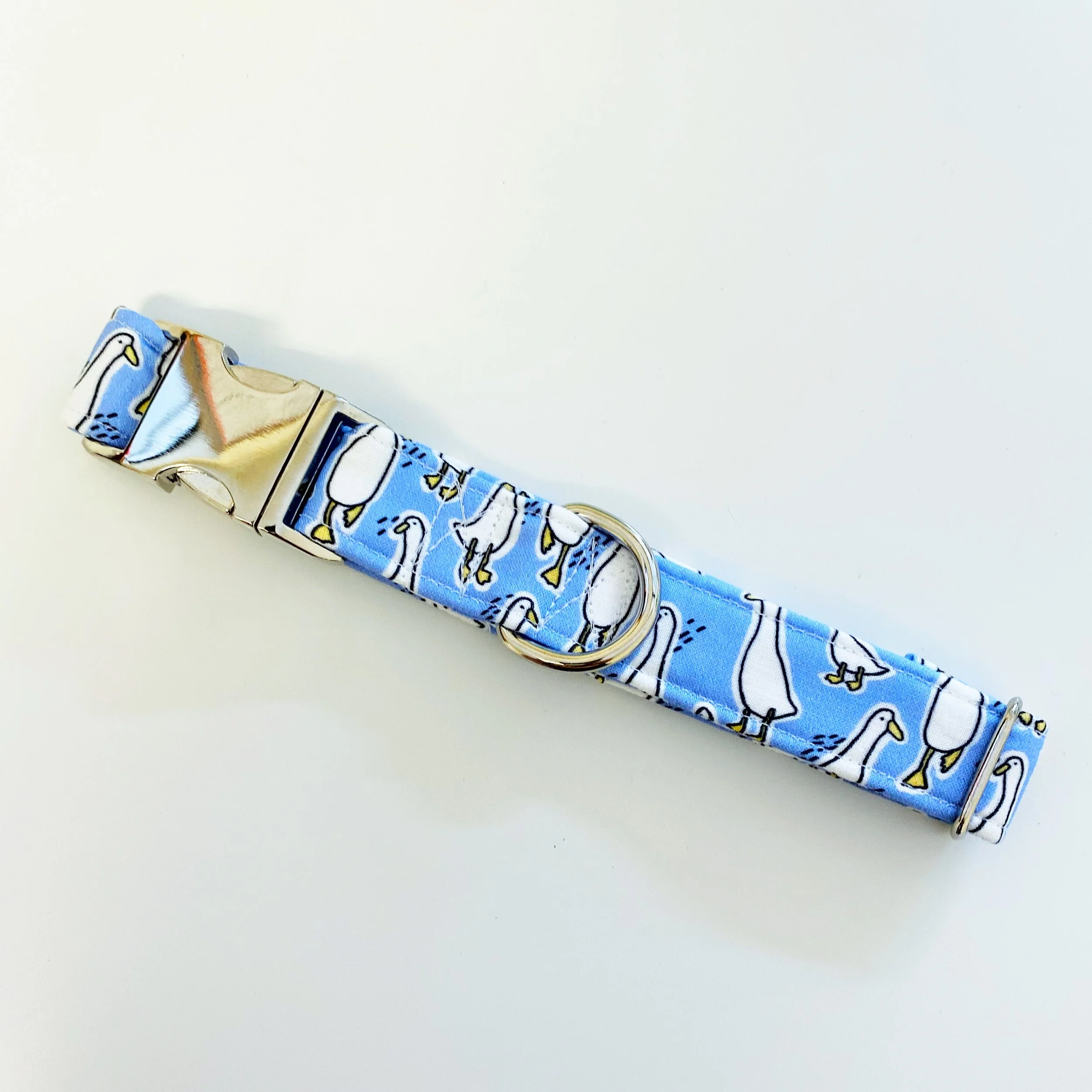 A dog collar with playful goose print.