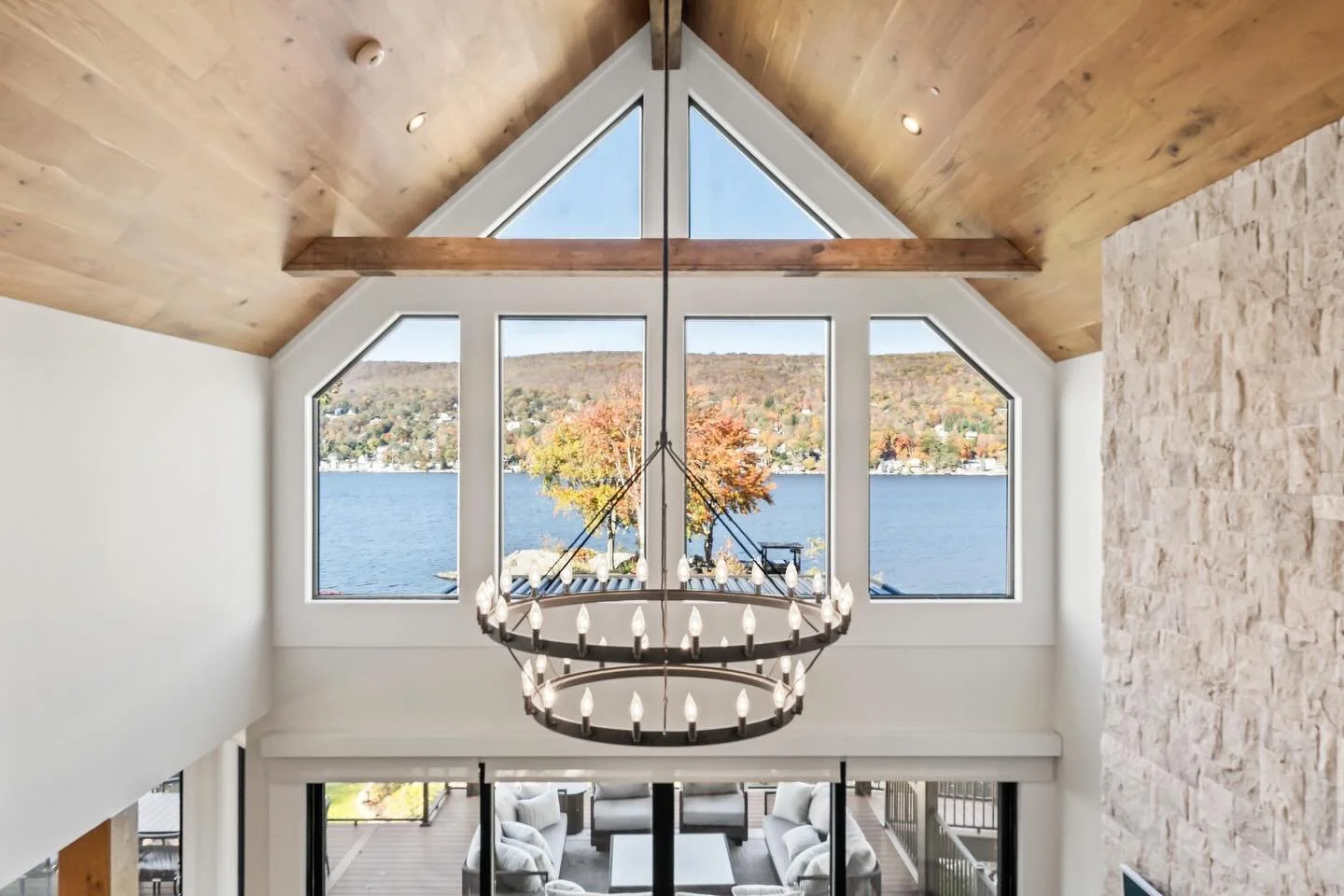 Lake season is approaching and we so excited this home will get a full season in! We took a look back at these photos and realized we really did capitalize on the lake views!

Their original home was charming but it had minimal views of the property 