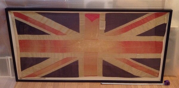 Lara RSL Boer War flag, rehoused inside a custom frame, to enable safe display, handling and long-term preservation. Lara RSL.
© Tiaki Objects Conservation.