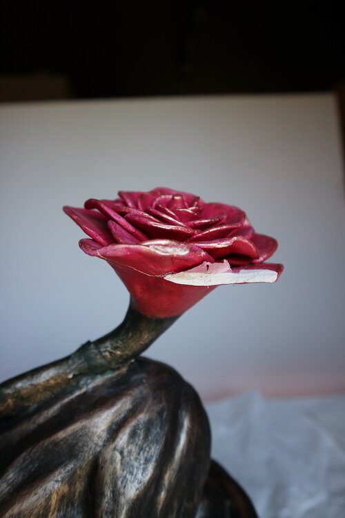 Detail of loss and cracks through the petals of the flower. Bunjil Place. © Tiaki Objects Conservation.