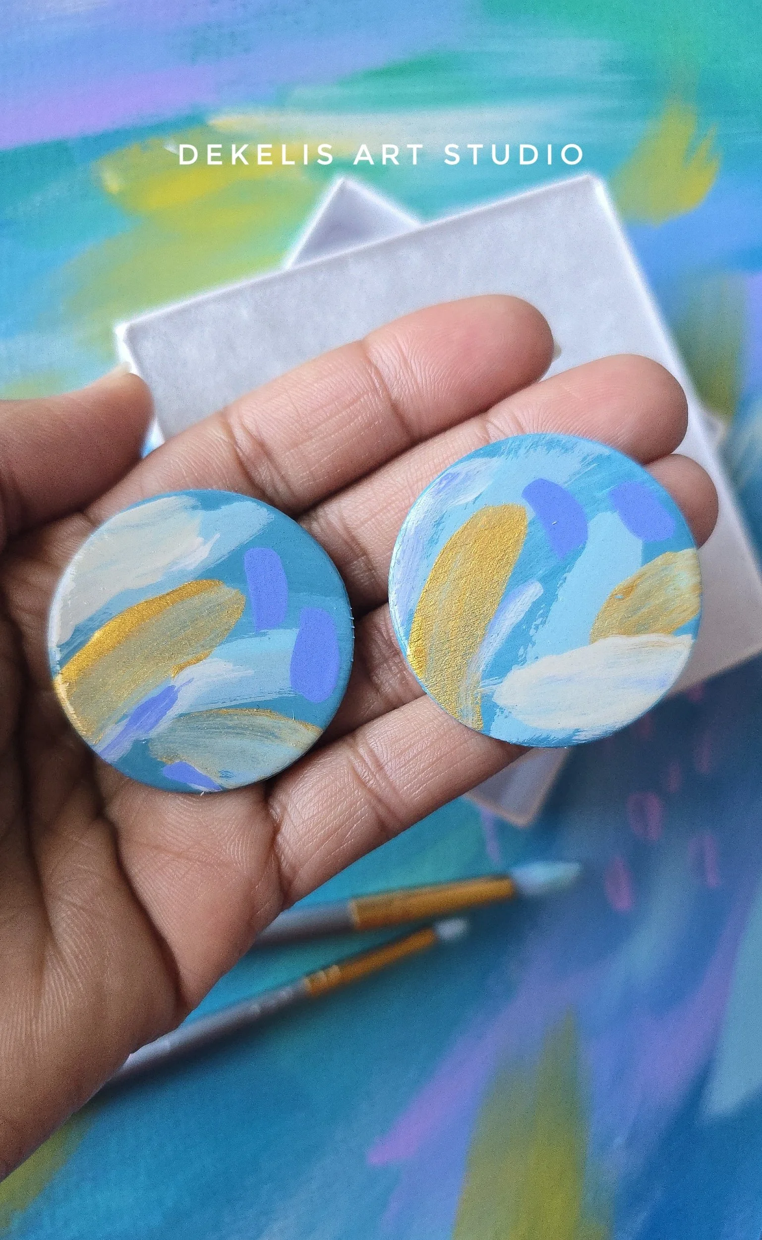 Hand‑Painted Wooden Circle Earrings — Blue, Cream, Teal and Metallic Gold by DeKelis Art Studio