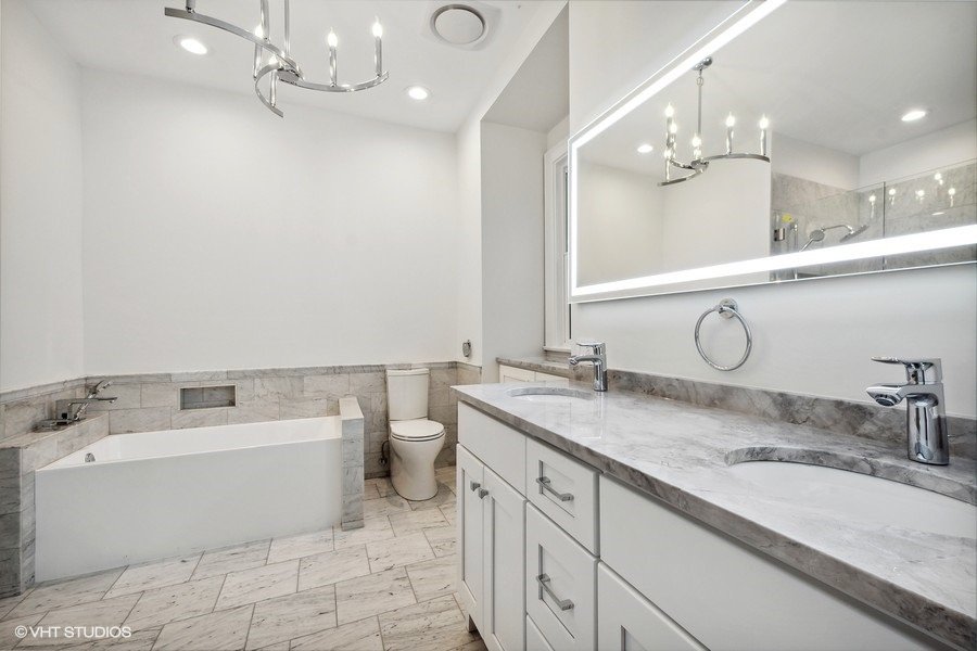17_1106JudsonAve_Unit1_13_PrimaryBathroom_LowRes.jpeg