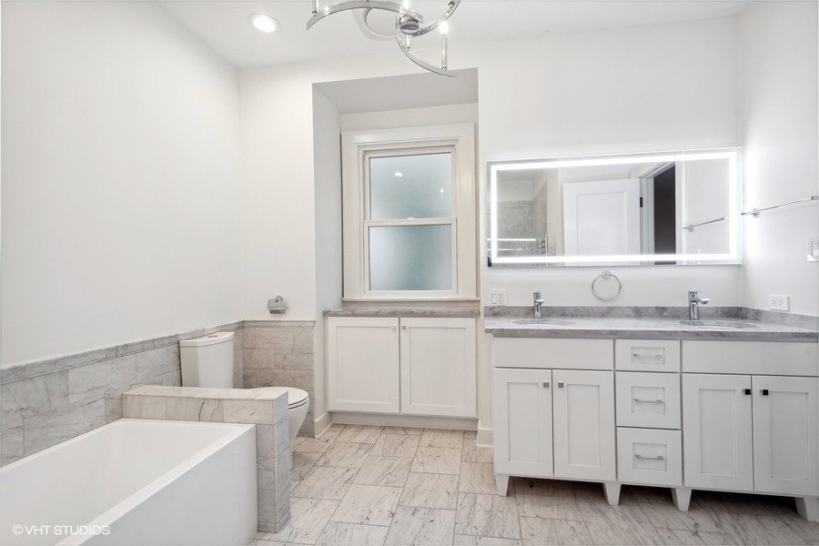 19_1106JudsonAve_Unit1_13001_PrimaryBathroom_LowRes.jpeg