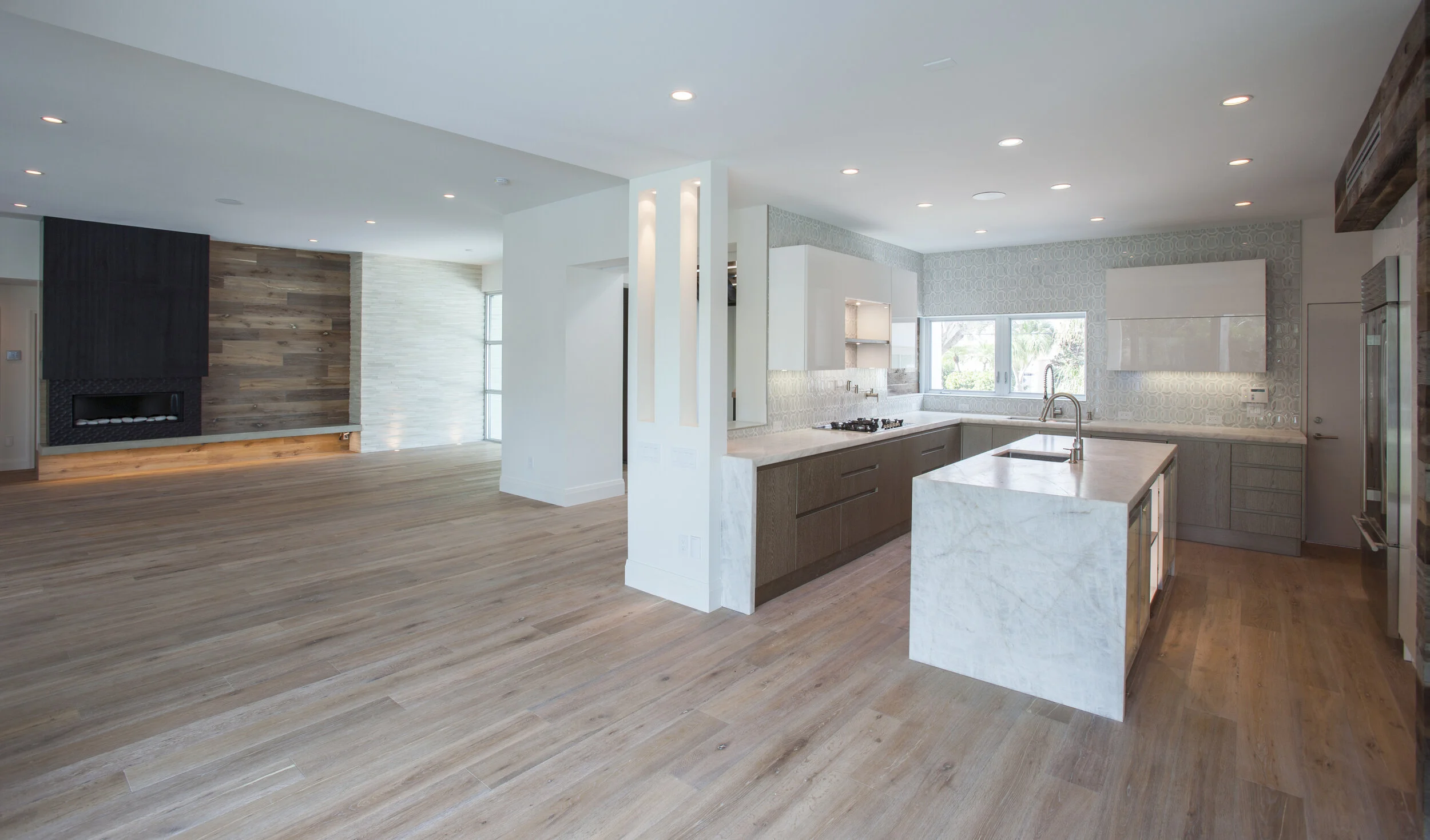 Harbor Beach custom luxury contemporary home with gourmet kitchen and open plan living area