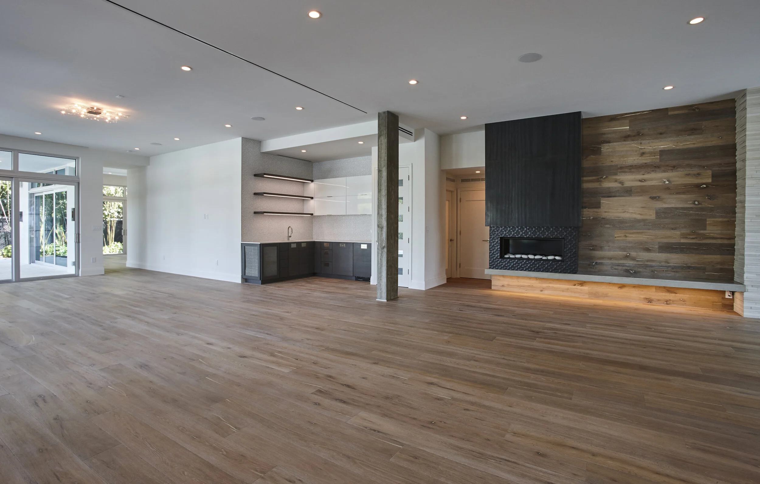 Harbor Beach custom luxury contemporary home with gourmet kitchen expansive open plan with reclaimed wood wall panels