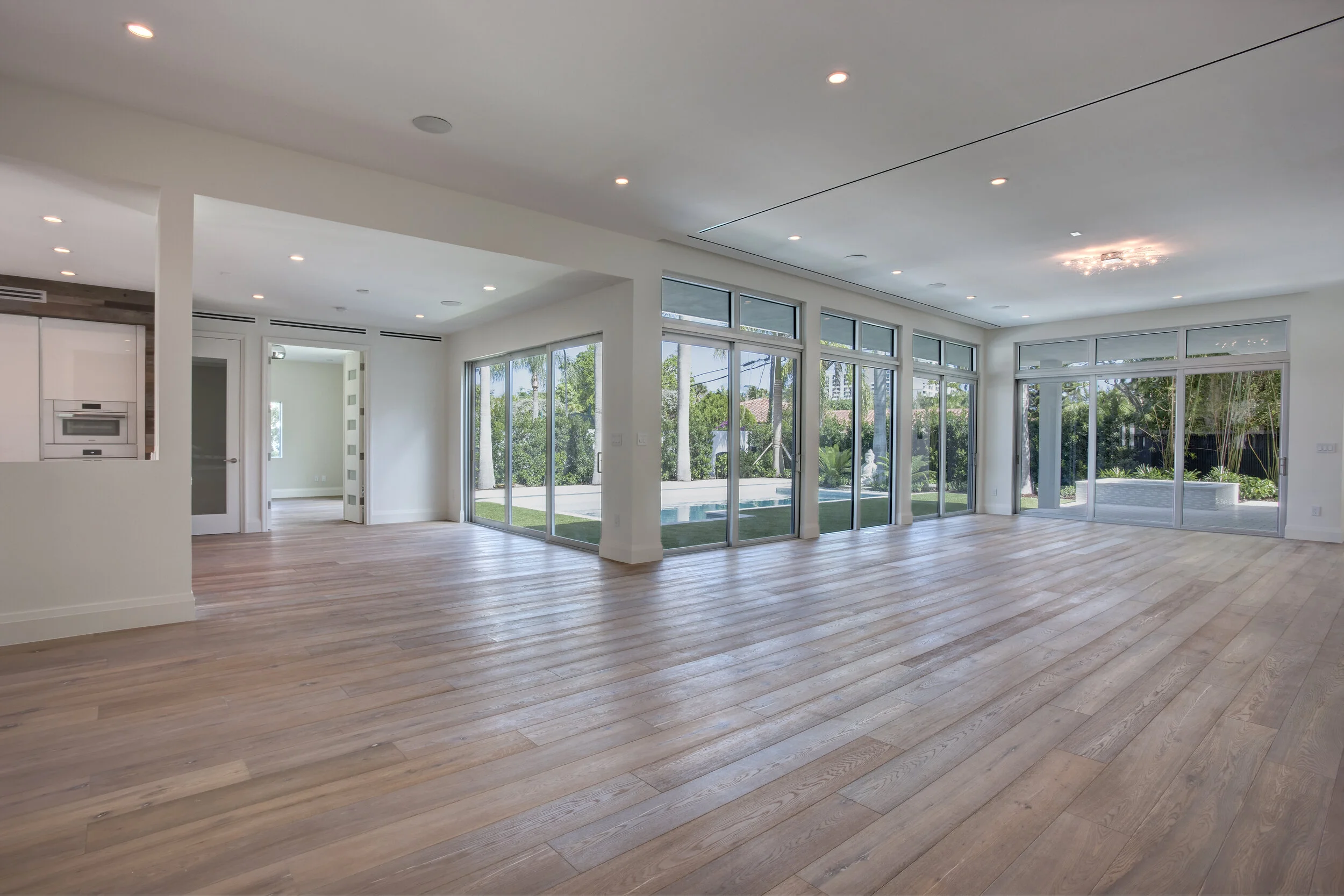 Harbor Beach custom luxury contemporary home with gourmet kitchen expansive open plan with floor to ceiling windows