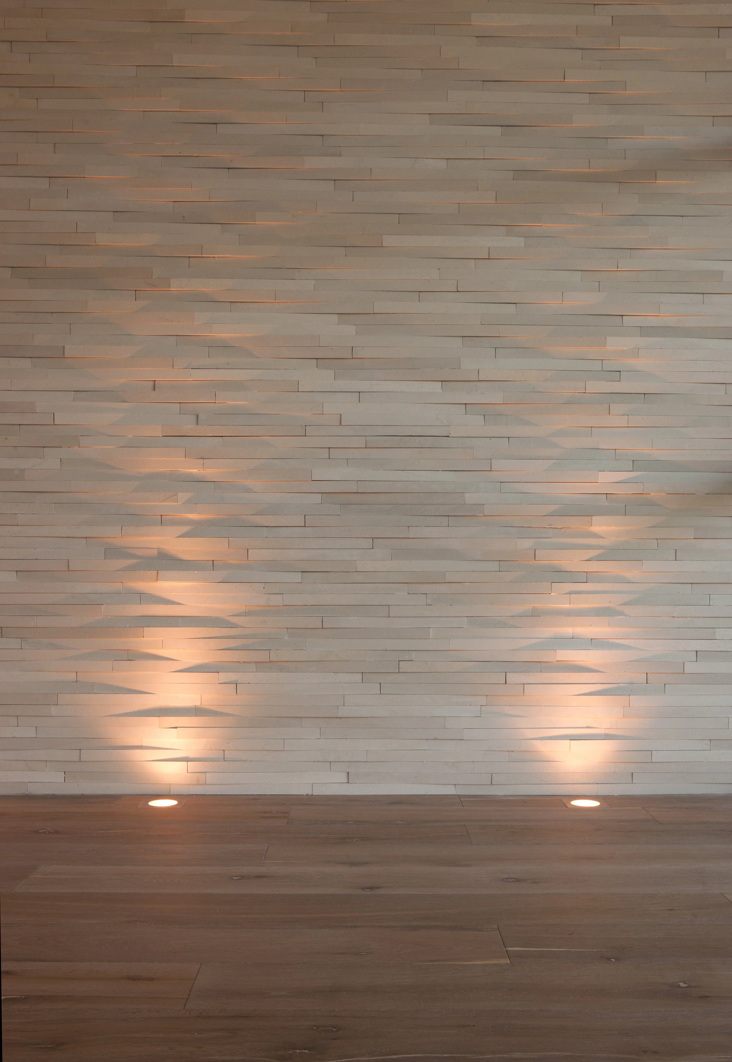 Harbor Beach custom luxury contemporary home with recessed floor lights to highlight wall panel relief