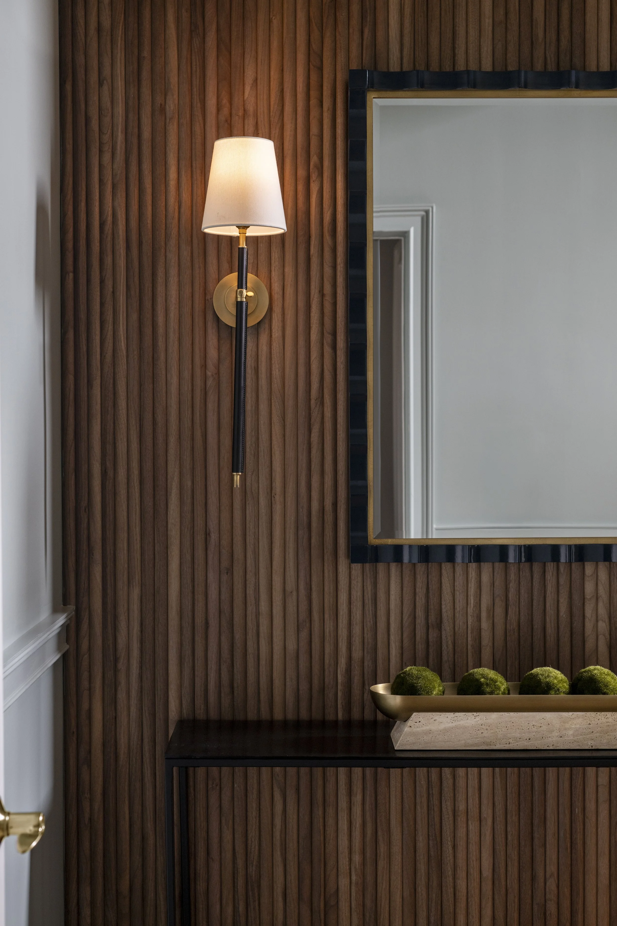 Sconce on fluted wall