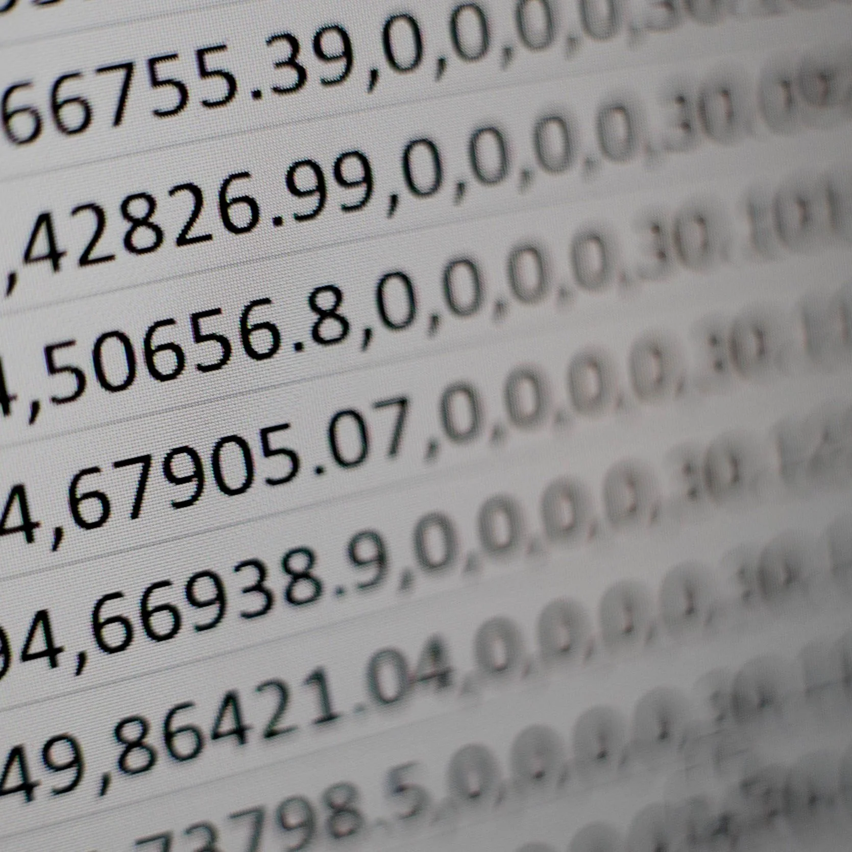 Zoomed in view of rows of typed numbers separated by commas