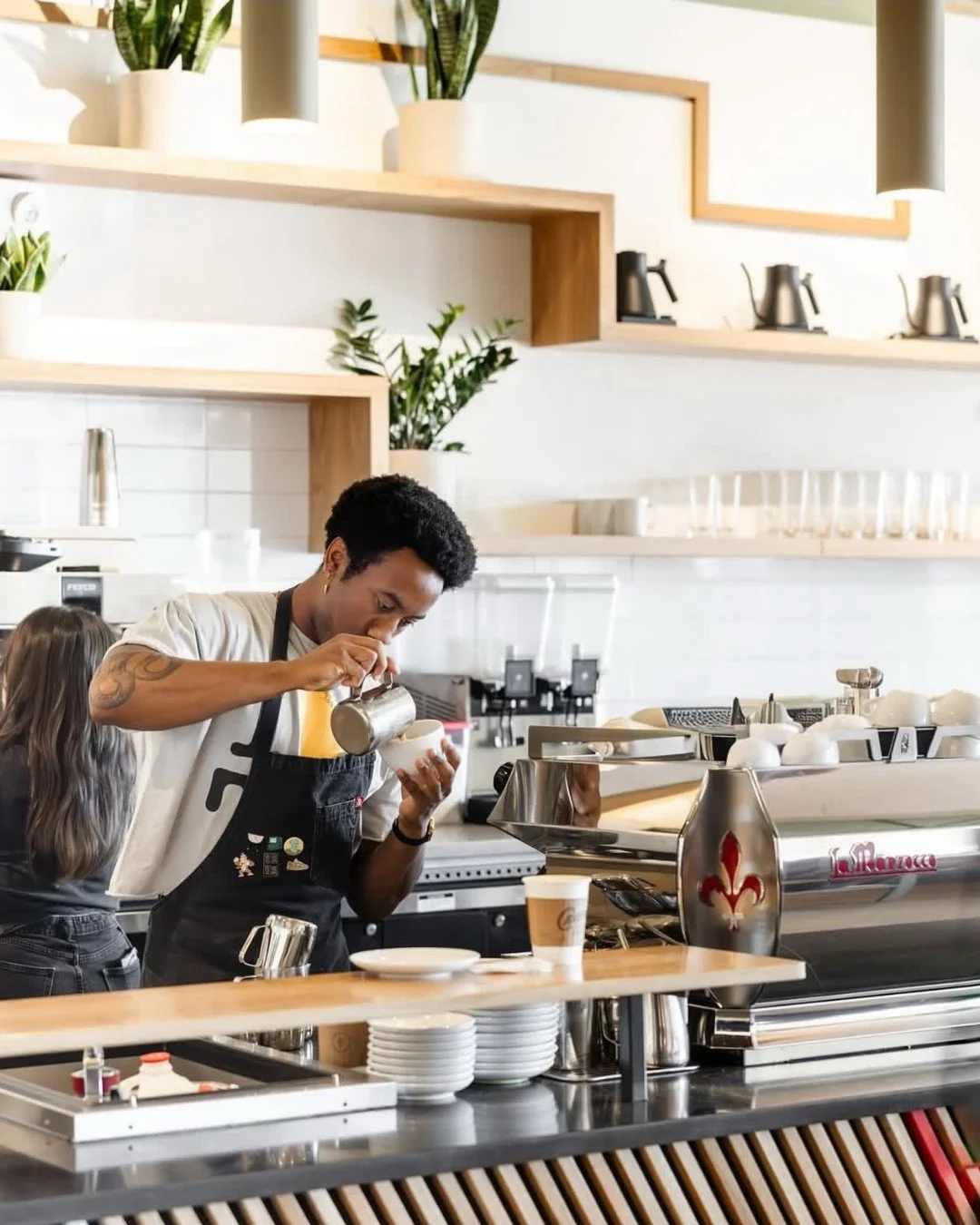Morning light. Good coffee. Thoughtful details. ☕️⁠
⁠
@cremacrema is one of those spaces where the ritual matters &mdash; the pour, the pause, the way light hits tile and wood at just the right angle. We focused on clean lines, warm materials, and su