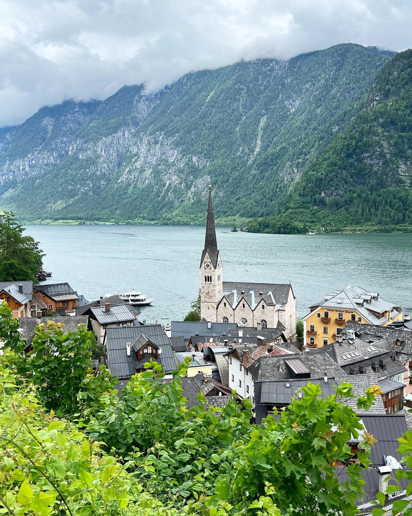 Moments in #hallstatt . &hellip;. We had thought about canceling our day in  #hallstattaustria because of the all day rain forecast. So glad we decided to risk it! We rode the funicular up the hill, hiked up the @salzwelten_official and back down to 