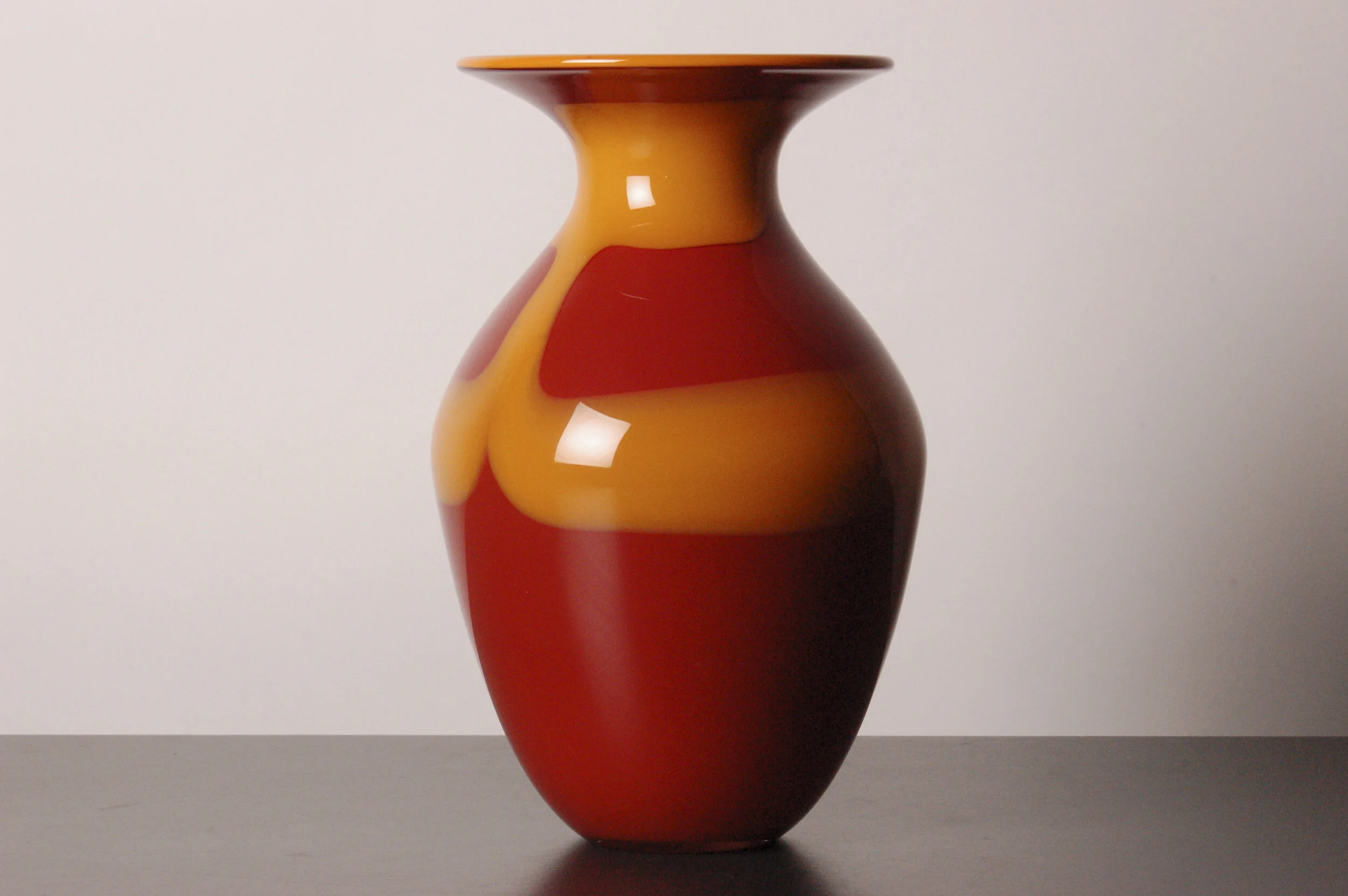 Antique red and curry yellow vase. (9”x4.5”) 2004