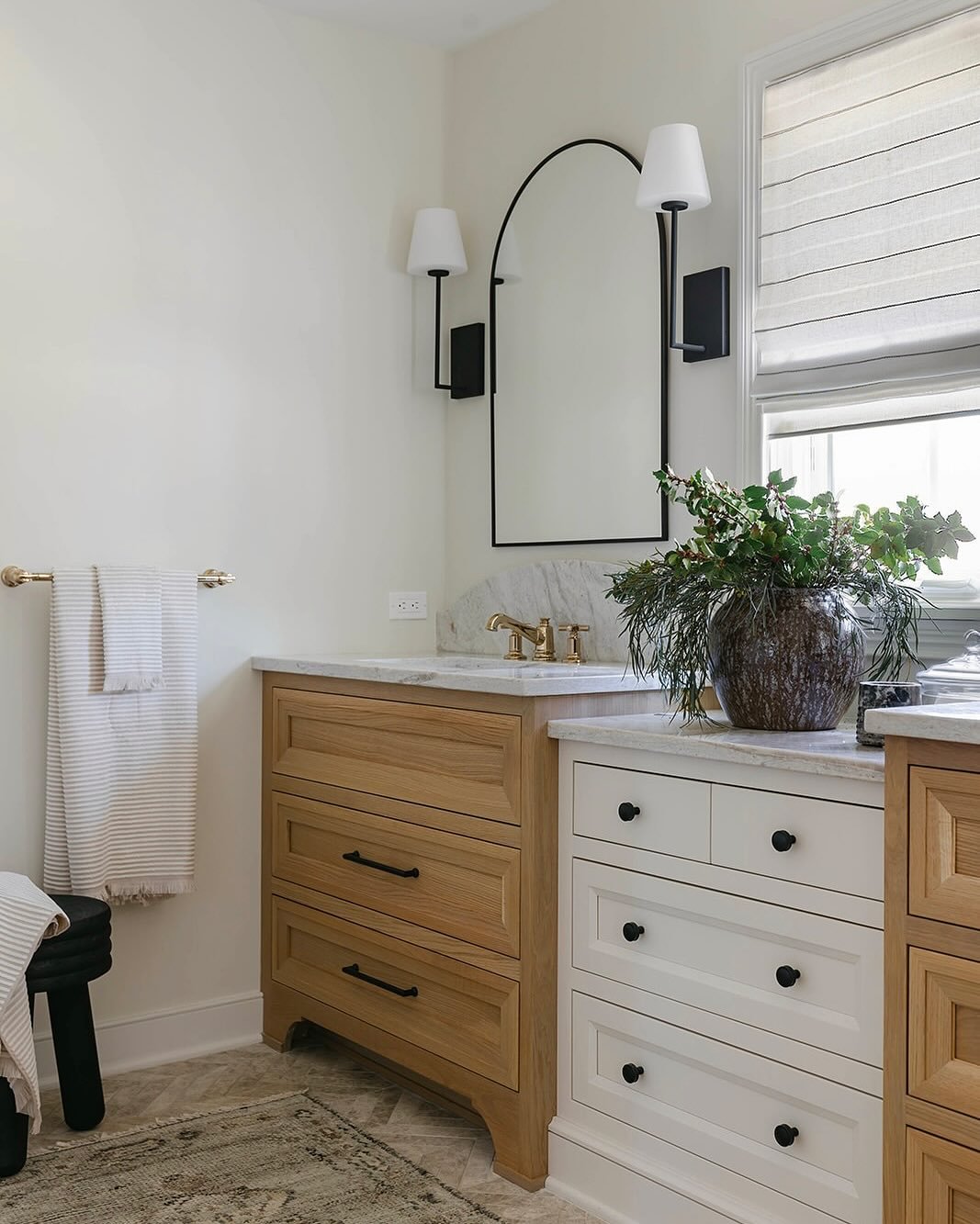 Before ✨ After
We combined the old walk-in closet with the open concept vanity to create a truly joyful and sun filled en-suite bathroom. We used three different natural stones (two marble tile combos) and quartzite countertops, along with white oak 