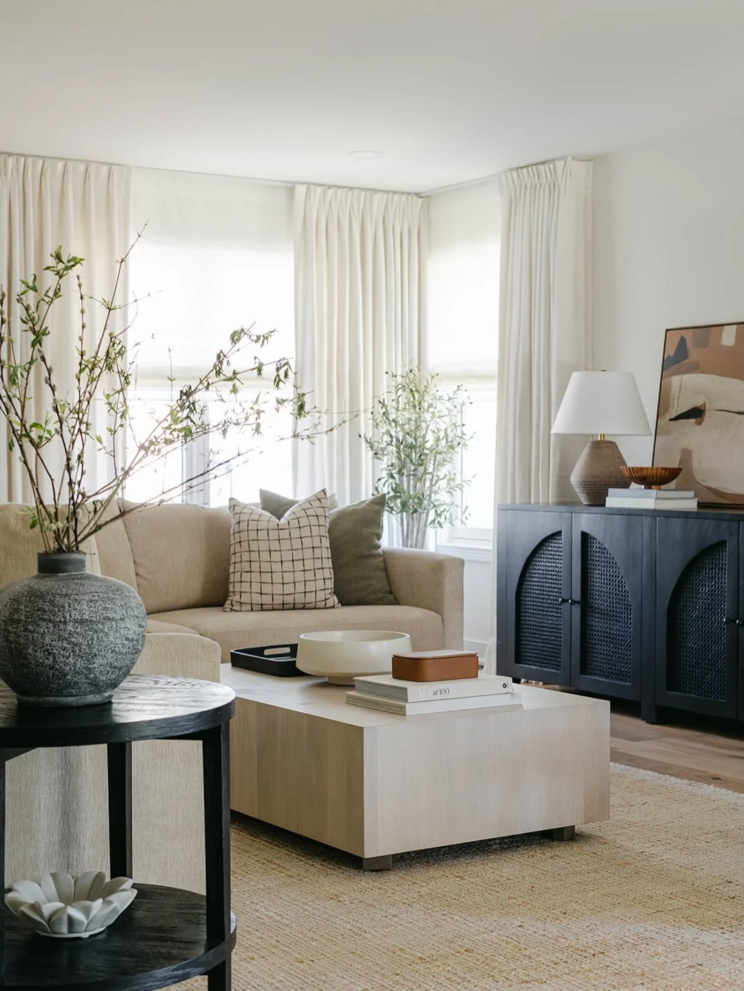 Layers and textures, bookcases and brick fireplaces, arches and millwork&hellip; even though this living room is sort of an open concept, it&rsquo;s cozy, grounded, and warm. 

Designed by us @stellanoirdesign 
Photography by @ramseybakerphotos_inter