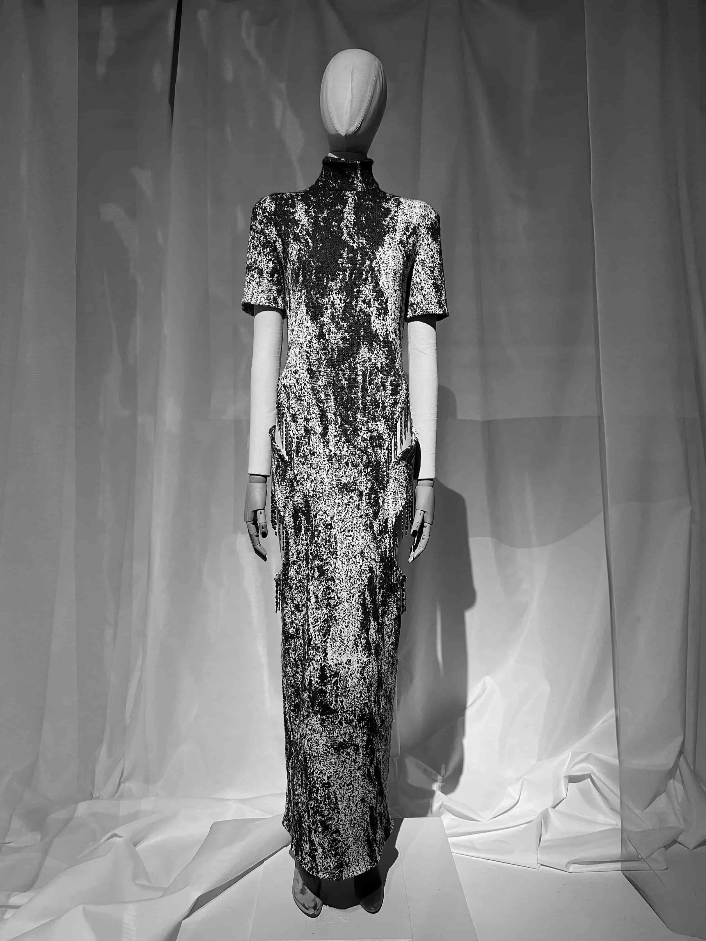 Mannequin dressed in a monochrome patterned gown from Keagan Roberson - an exploration of structure, abstraction, and craftsmanship.