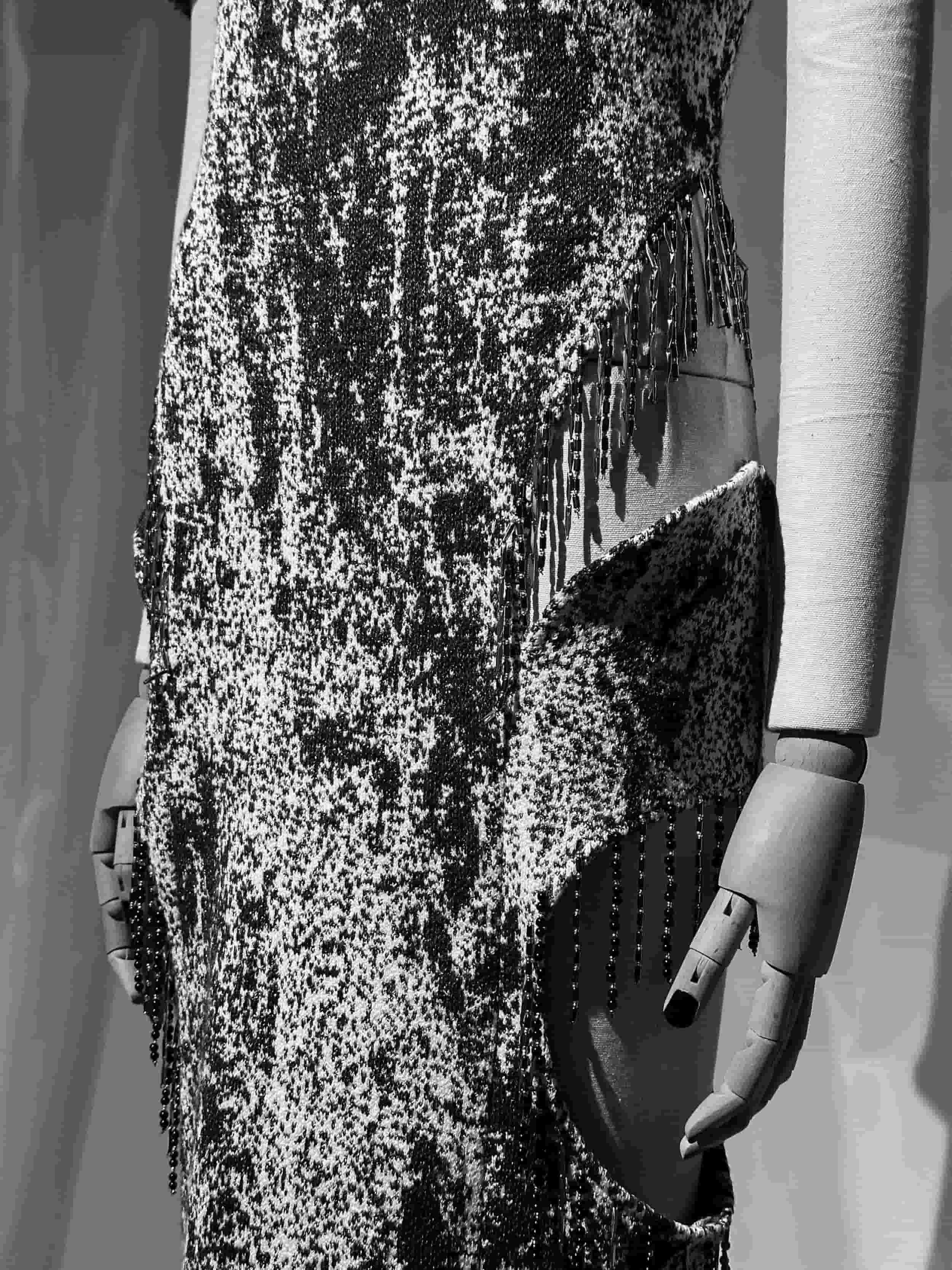 Mannequin dressed in a monochrome patterned gown from Keagan Roberson - an exploration of structure, abstraction, and craftsmanship.