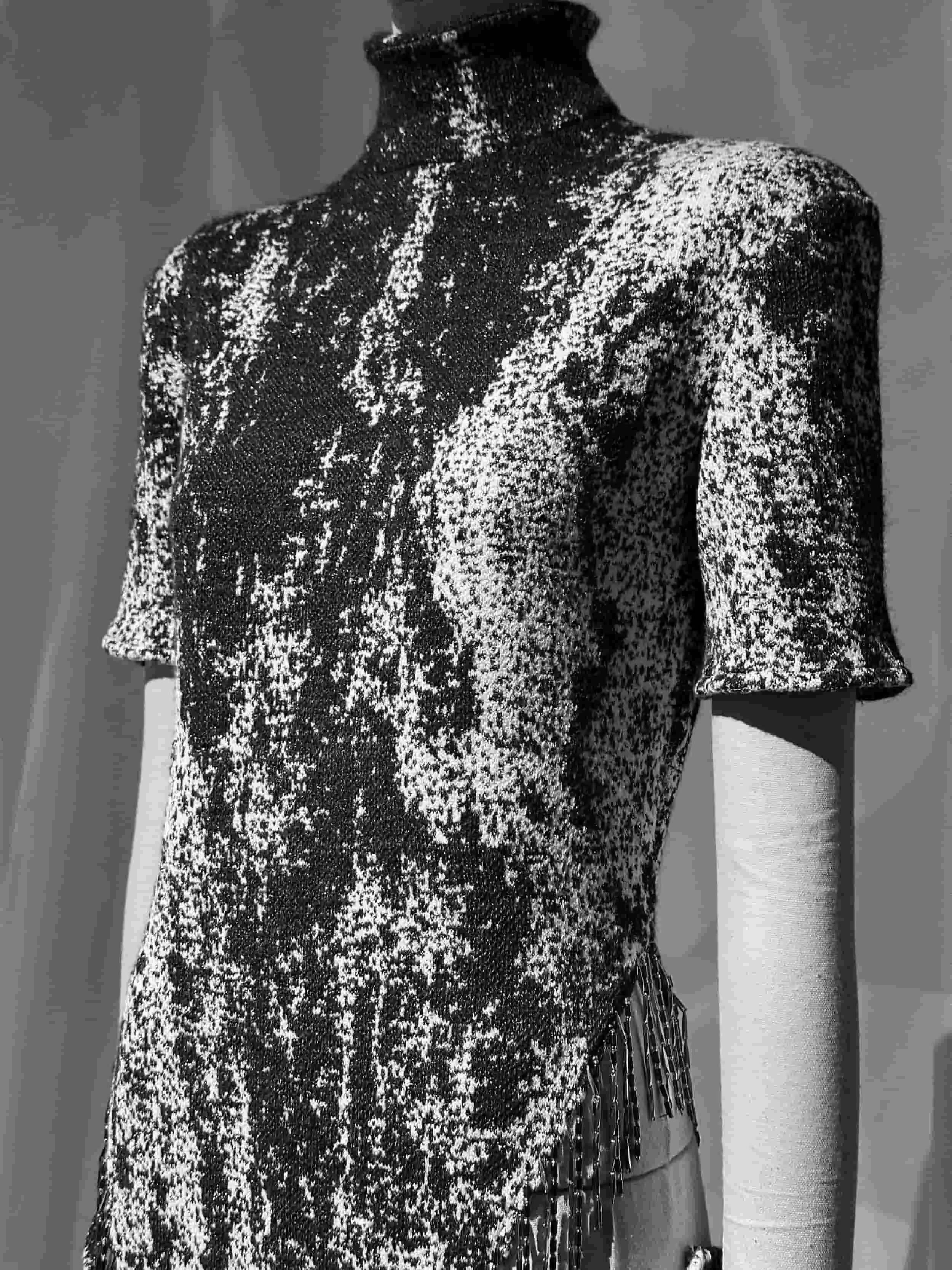 Mannequin dressed in a monochrome patterned gown from Keagan Roberson - an exploration of structure, abstraction, and craftsmanship.