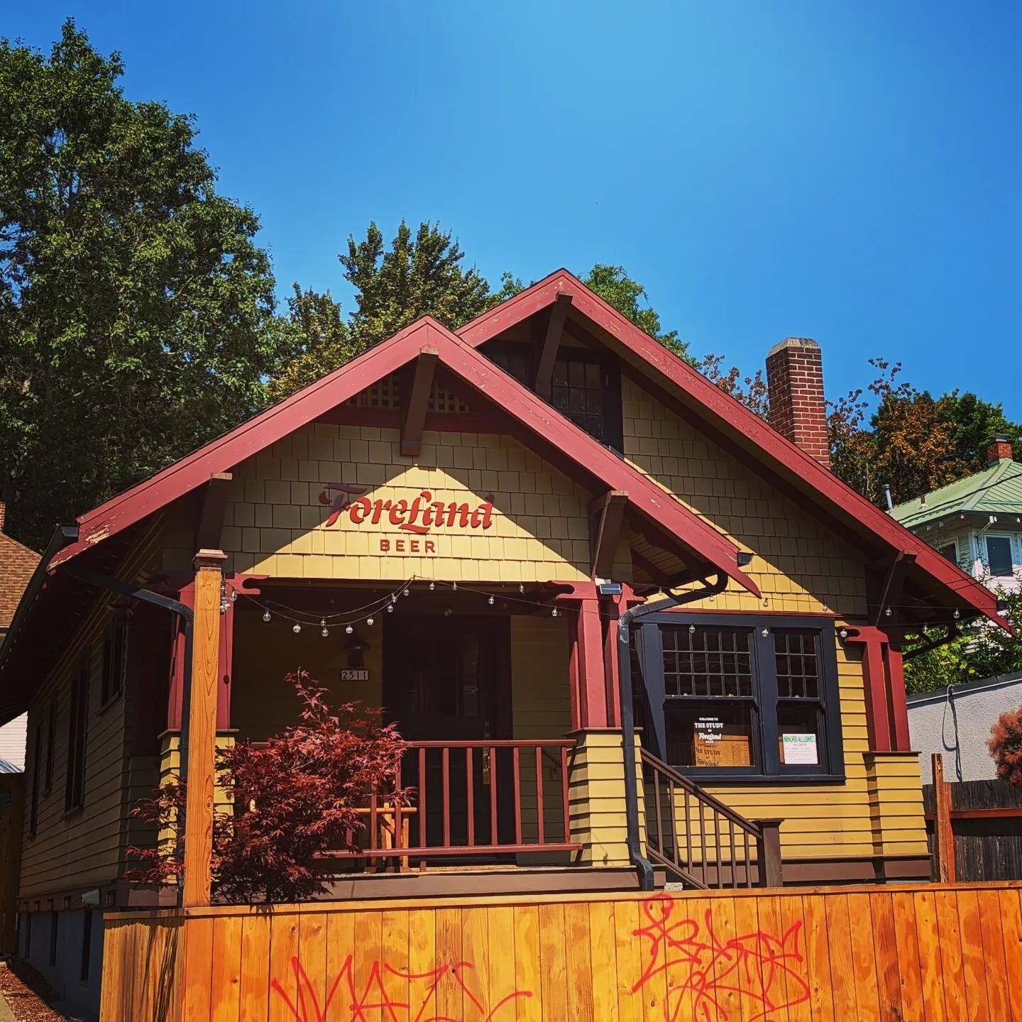 Our Portland location, The Study, looks especially beautiful under blue skies (even with our latest batch of graffiti defacing our nice fence 😮&zwj;💨). 

Open until 9pm today. Come by for a pint of Supersymmetry Fresh Hop IPA or a mug of one of our