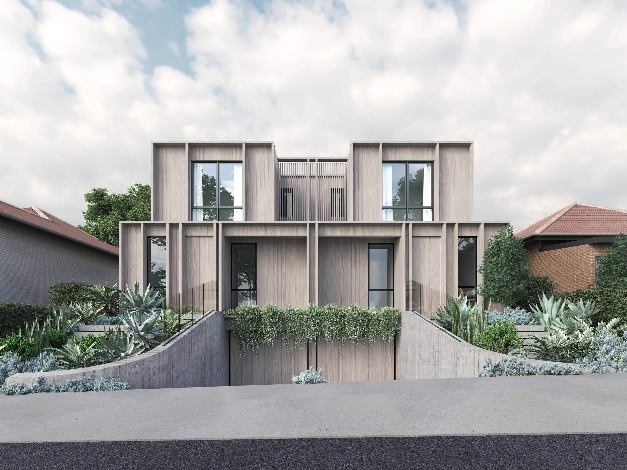 Front exterior of a Five Dock Passivhaus duplex in Sydney featuring timber cladding, modern architecture, and sustainable design