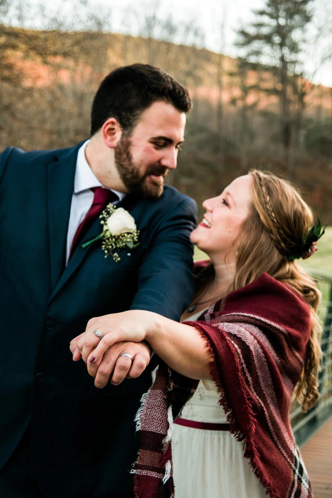 couple-showing-off-wedding-rings-vermont.jpg
