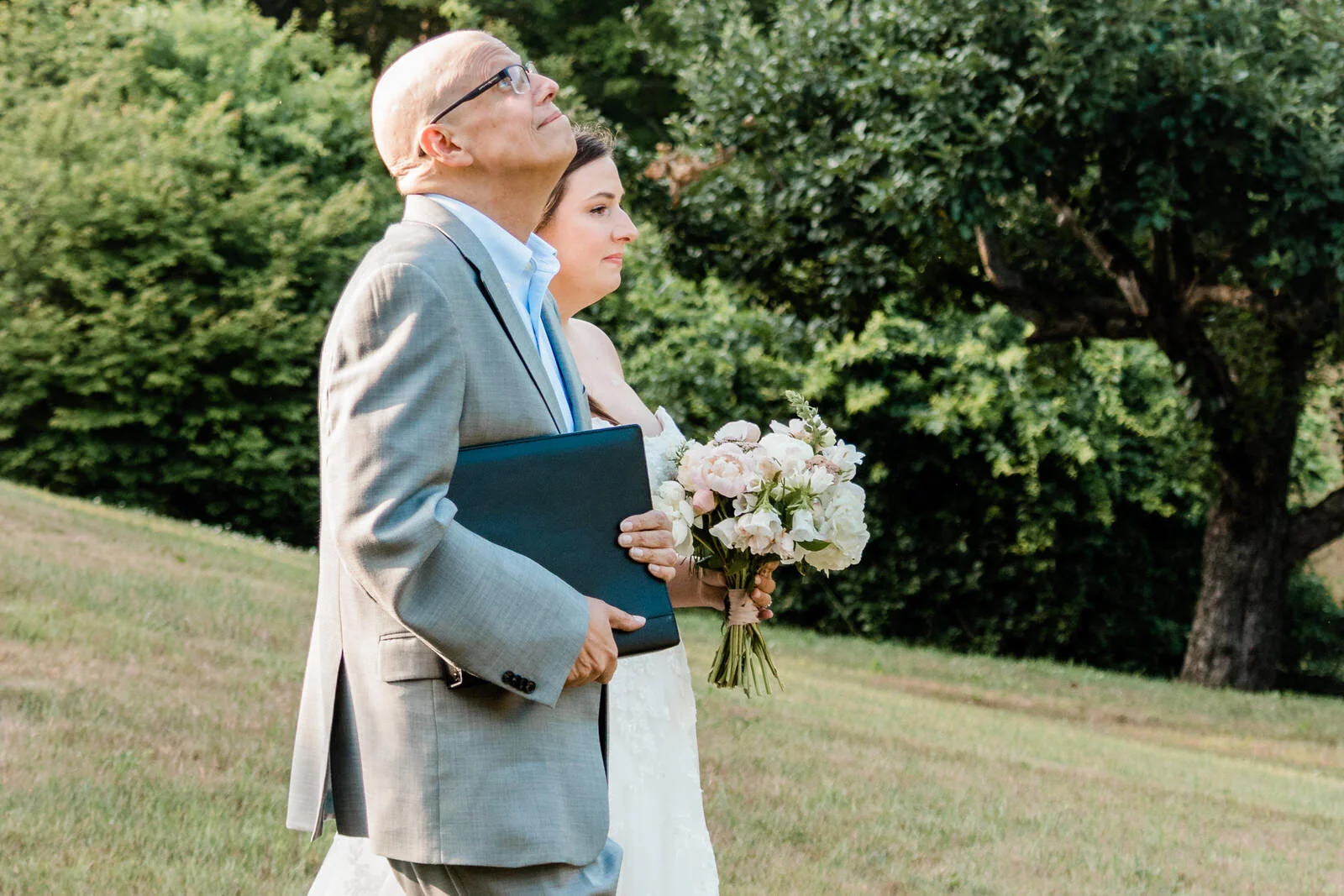 father-of-bride-walking-down-aisle-before-ceremony.jpg