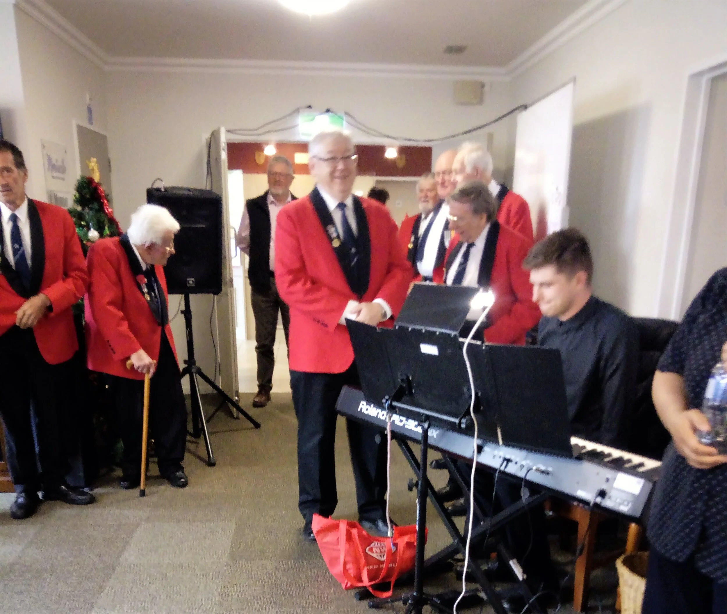 Choir members and Johnny.