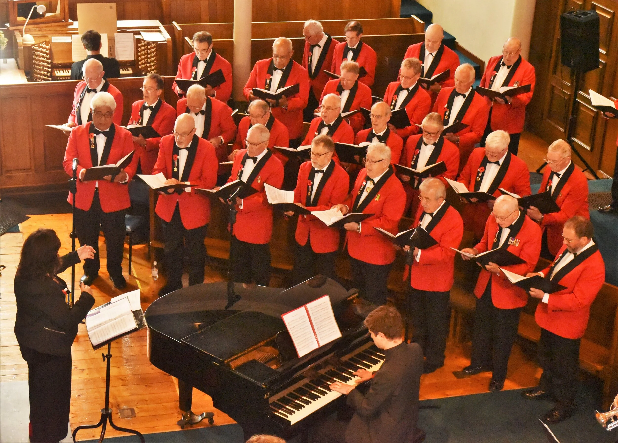 The Choir’s Baritone and Bass sections with three Tenor’s on the left..