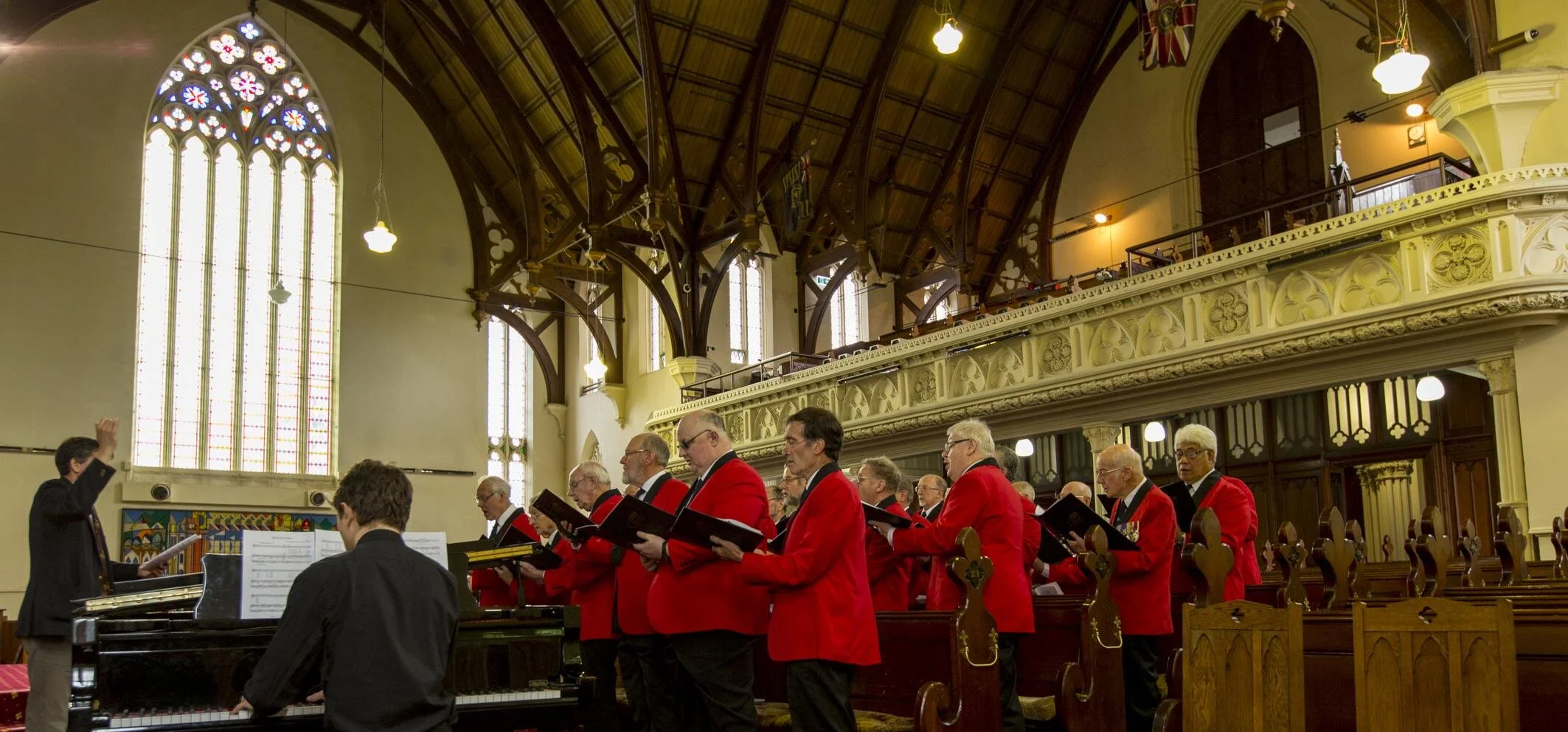 The choir singing at the Police Remembrance Ceremony in Fist Church. David Burchell conducting and Johnny Mottershead on the piano.