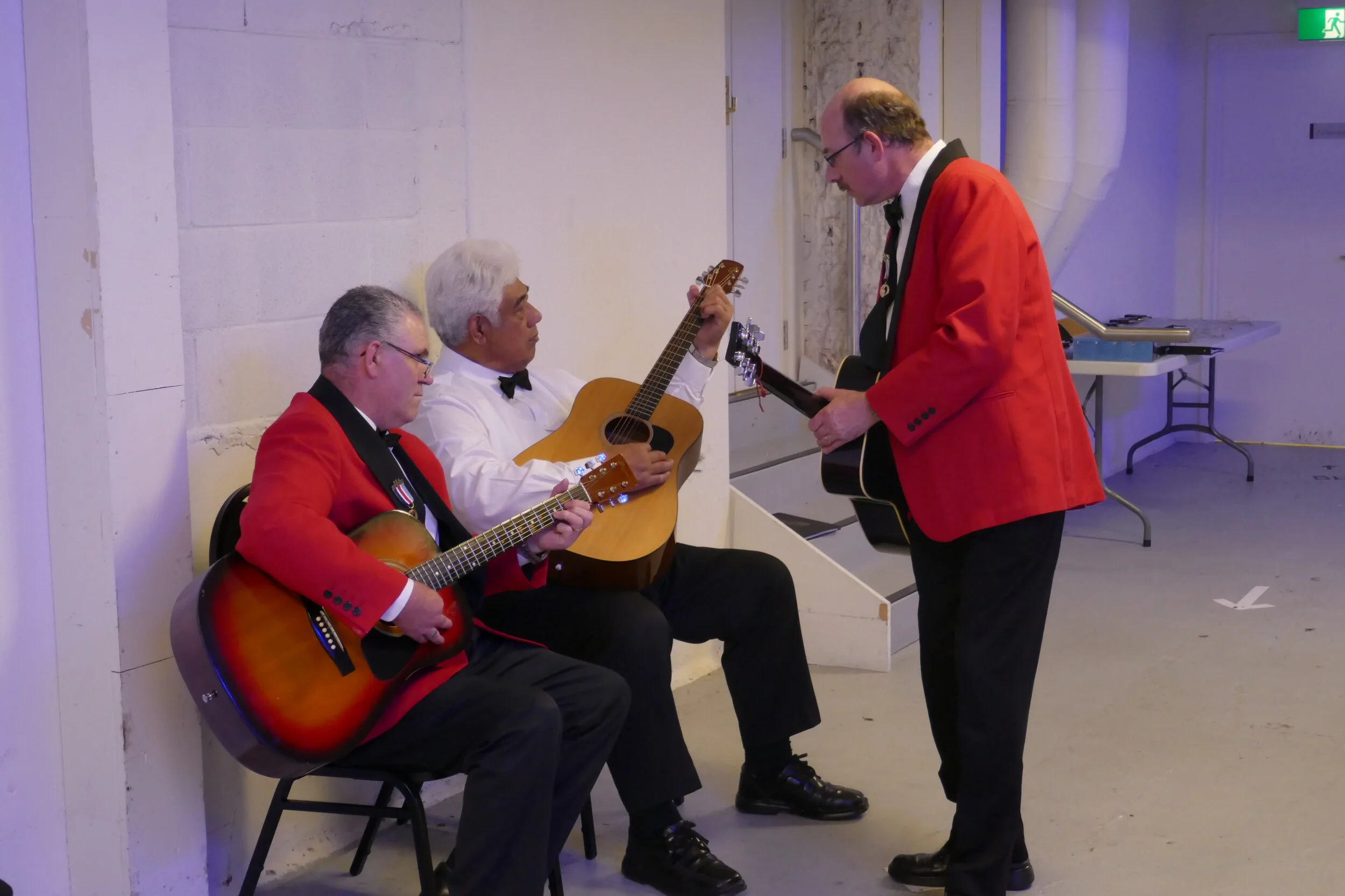Allister, Foalima &amp; Peter getting ready for their performance with the Outcasts.