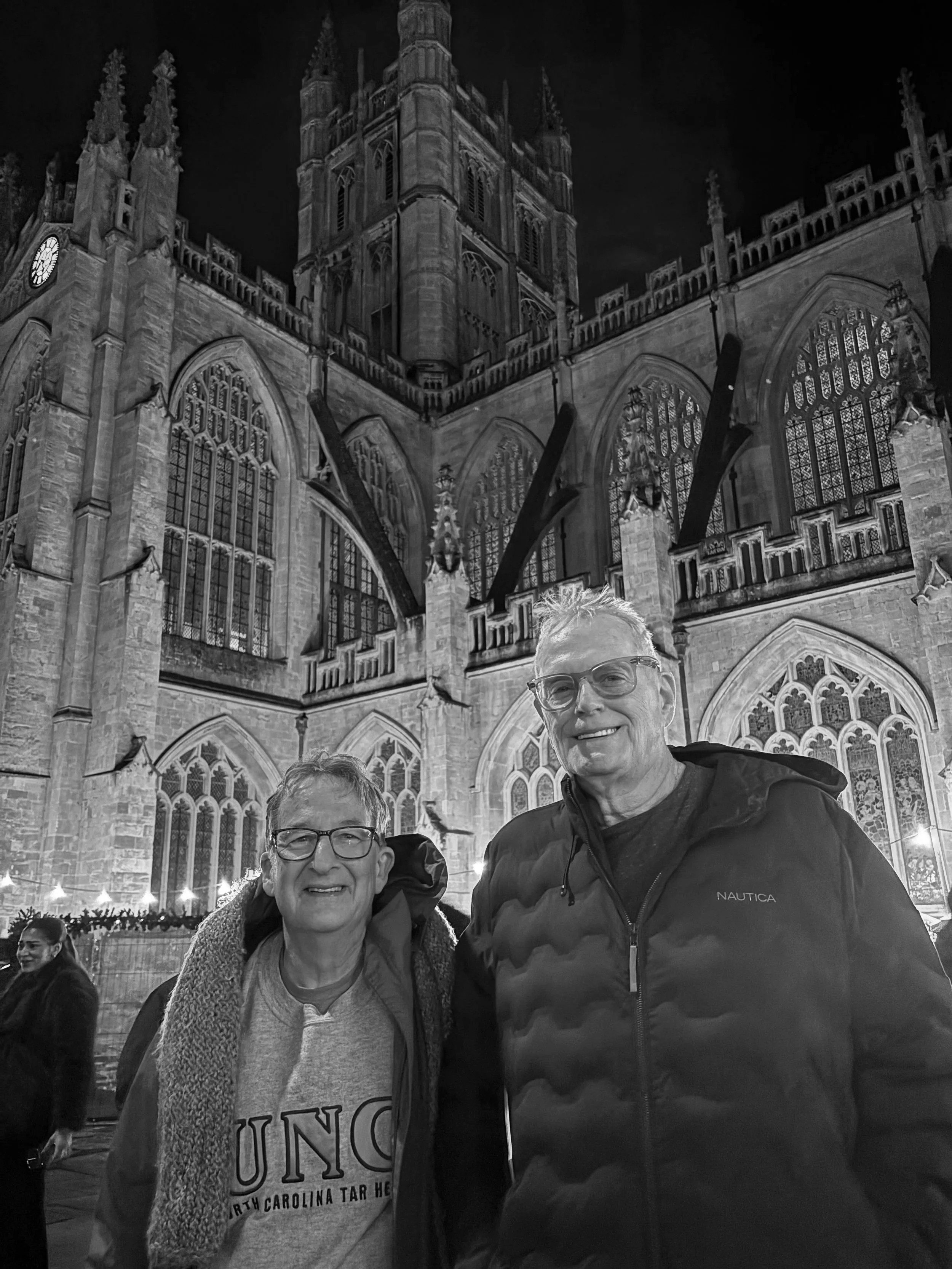Warren Rochelle and Gary Nelson with Bath Abbey  as a backdrop