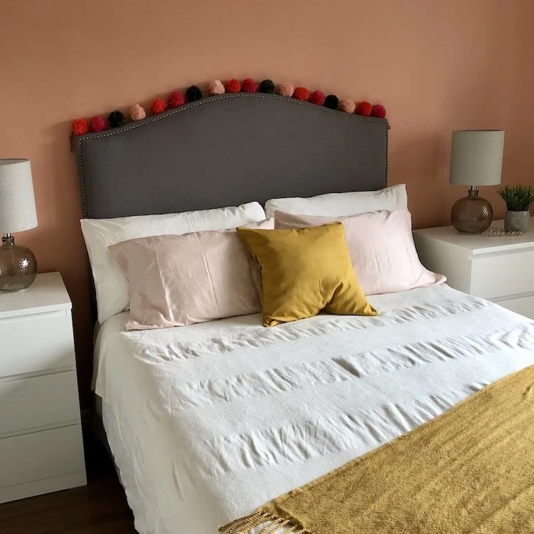 Bedroom with a bed and matching nightstands