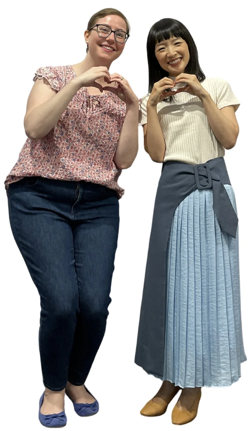 Kati Carrapa and Marie Kondo making heart hand gestures