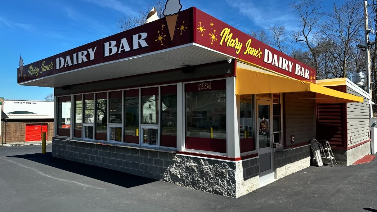 Who loves ice cream?! We do! @mjdbar is finally open for the season, everyone needs to check Meg and her team out for some of the best ice cream around! We had the pleasure of dressing up the exterior windows for before her grand opening and we will 
