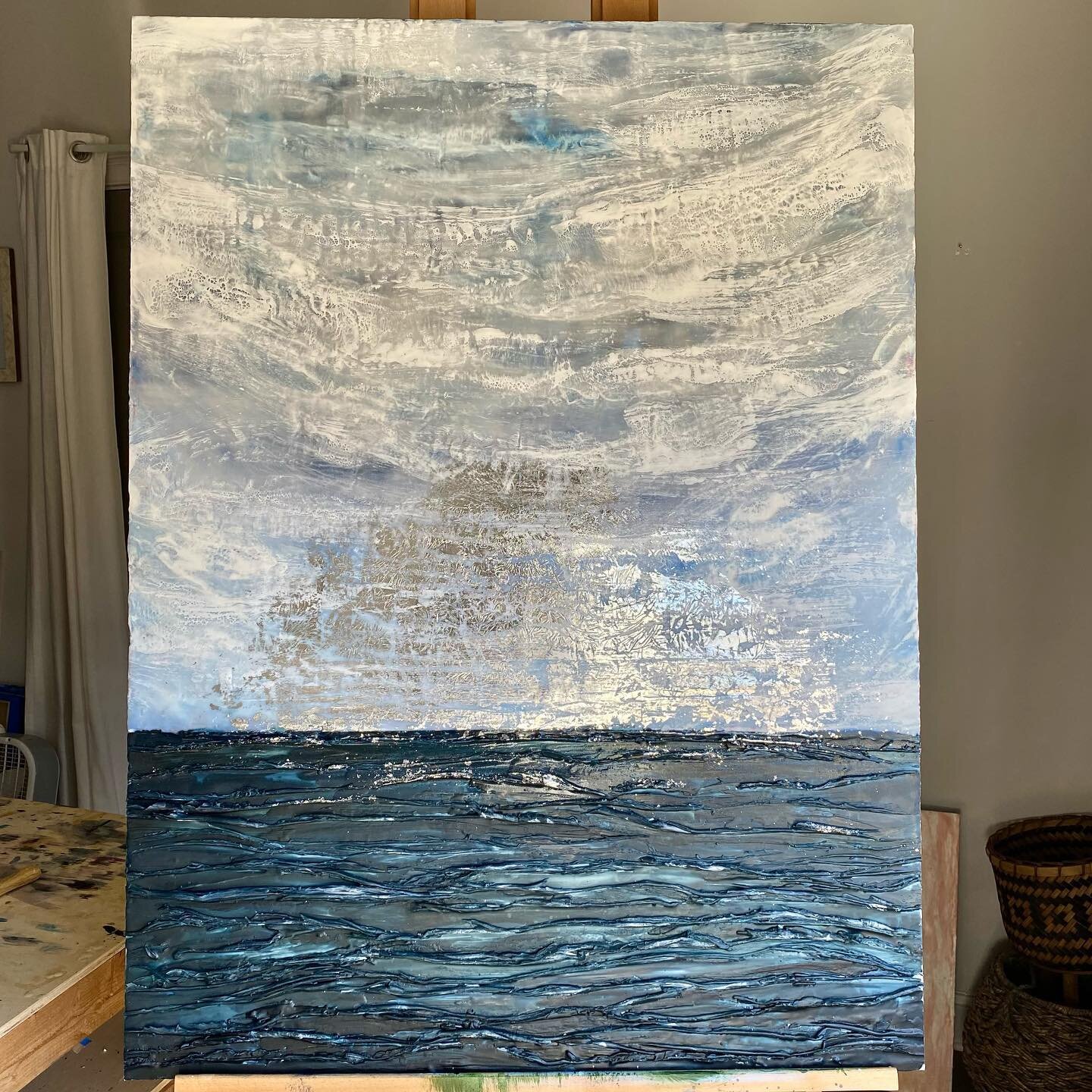 Obsessed with the way the silver on this #wip catches the sunlight coming into my studio today. Currently working on adding all that texture to the waves. My fav part!
#encausticart #encausticartist #encaustic #beeswax #beeswaxartist #paintingwithfir