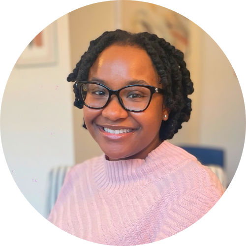 Beautiful brown girl with glasses and bright smile