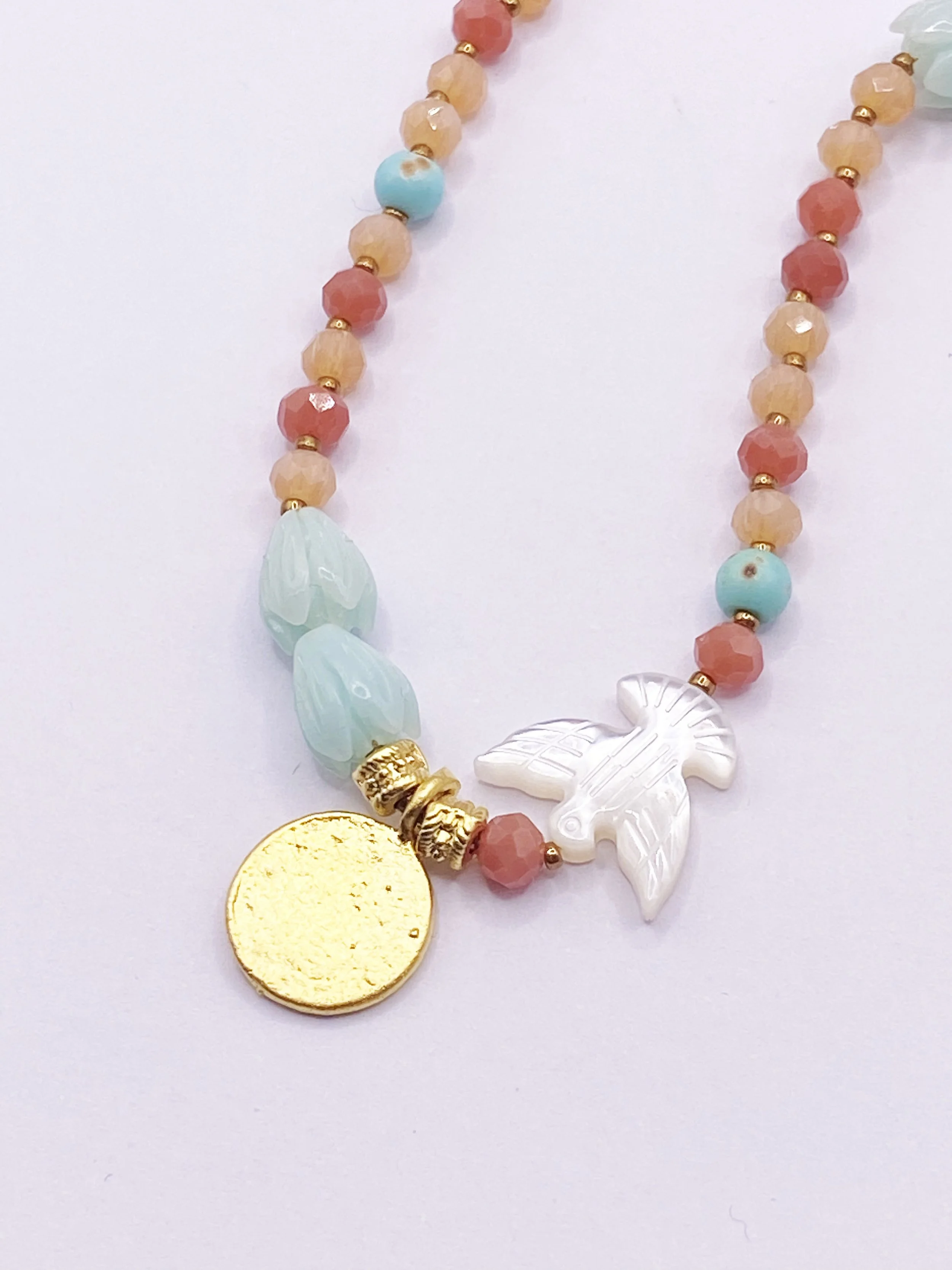 multi mpother of pearl birdie.jpg