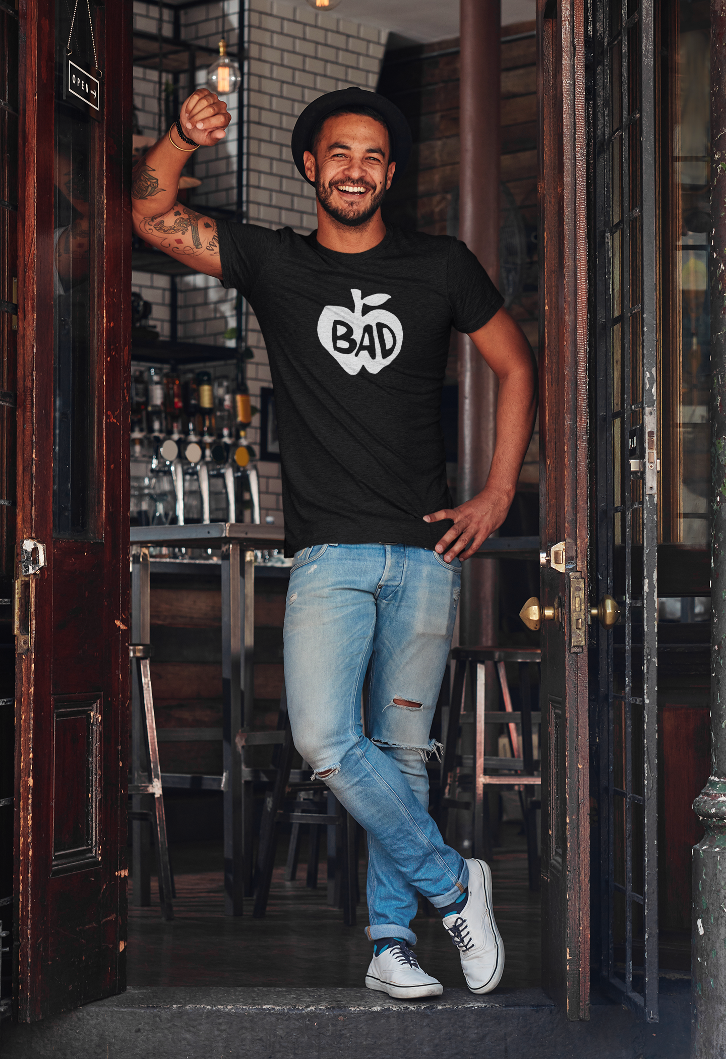 heathered-tee-mockup-of-a-man-standing-at-a-bar-s-entrance-34985-r-el2.png